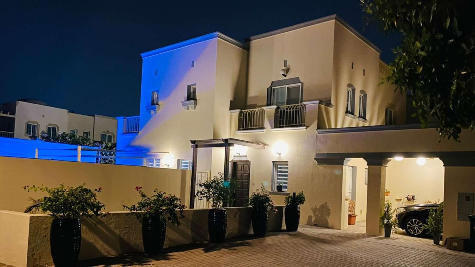 Type 4E Villa exterior with private pool, Springs 14, for rent, night view