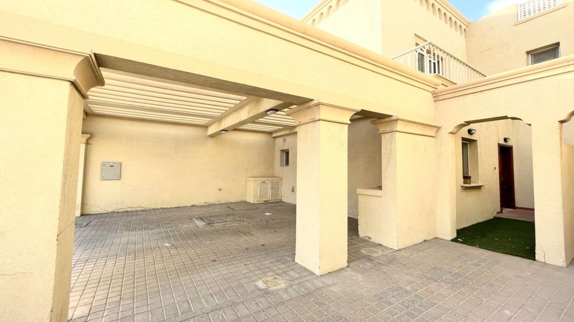 Balcony view from vacant villa in Springs 11, showcasing lush greenery and serene surroundings