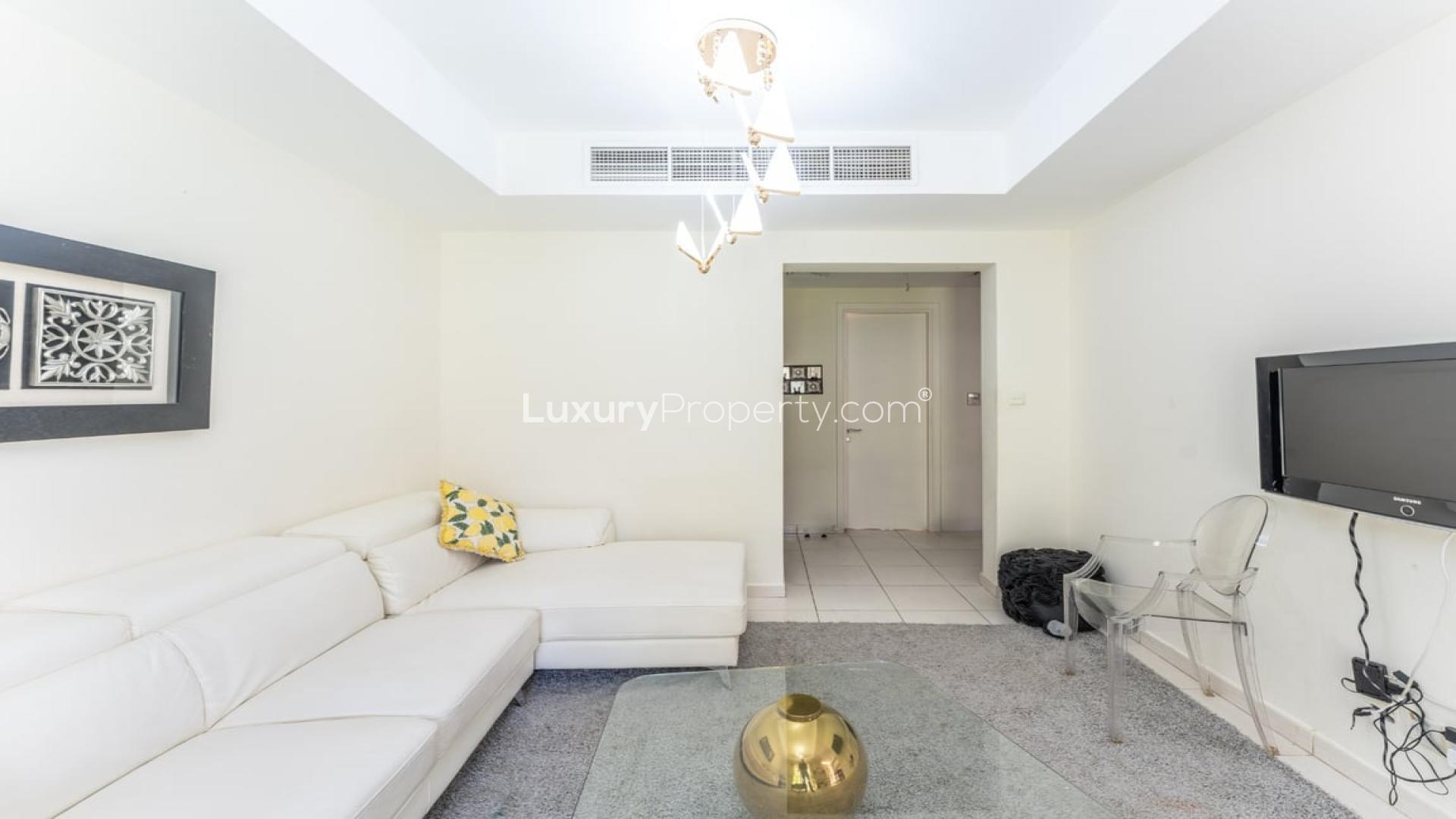 Modern living room in 2-bedroom villa, Springs 14, The Springs, bright decor, spacious seating area