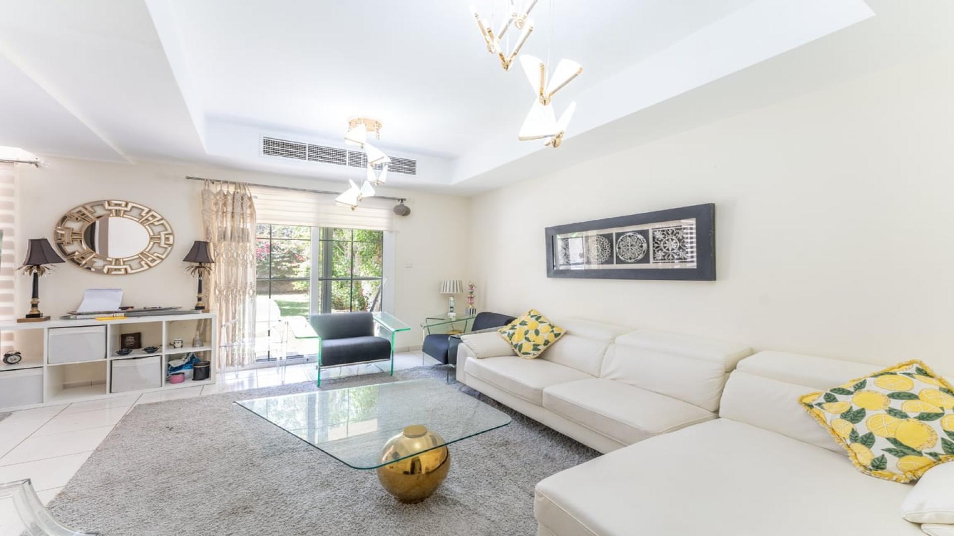 Modern living room in Springs 14 villa, featuring stylish furniture and elegant decor