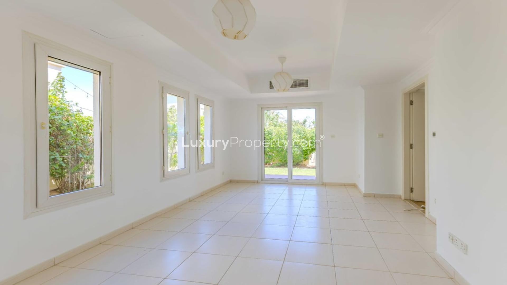 "Balcony view of park from 2-bedroom villa in Springs 4, Dubai for rent.",Bright living room in 2-bedroom villa with garden view in Springs 4, Dubai