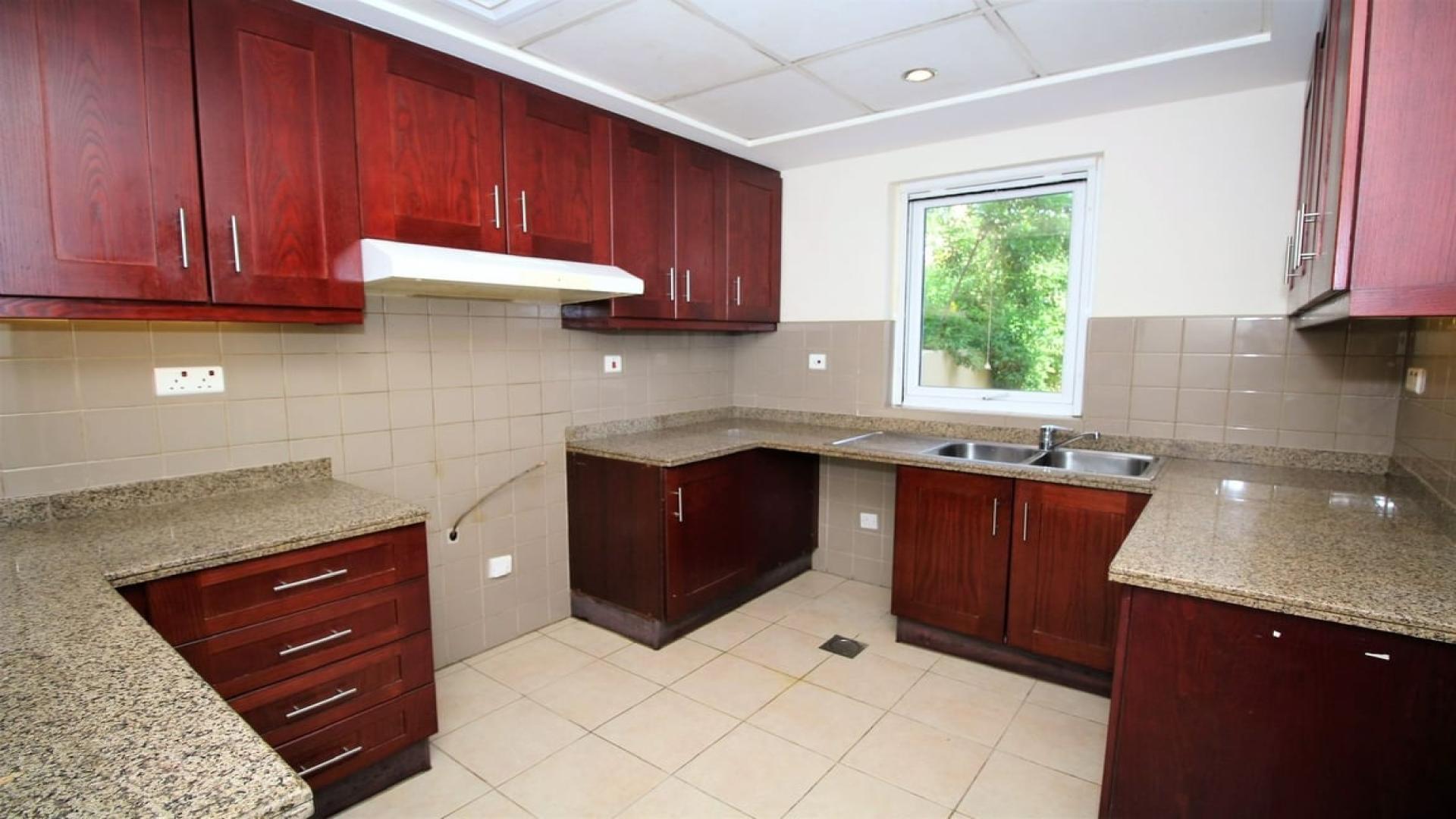 Spacious living area with staircase in 2-bedroom villa, Palmera, Arabian Ranches, Dubai