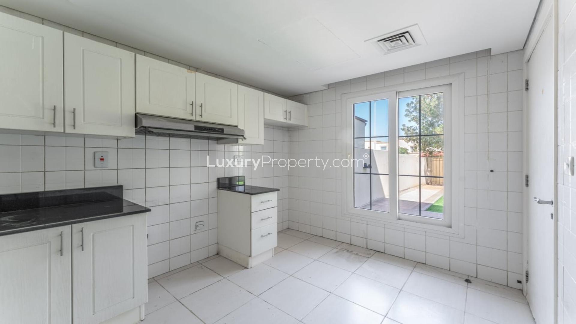 Bright living room with large windows in 2-bedroom villa, Springs 10, The Springs