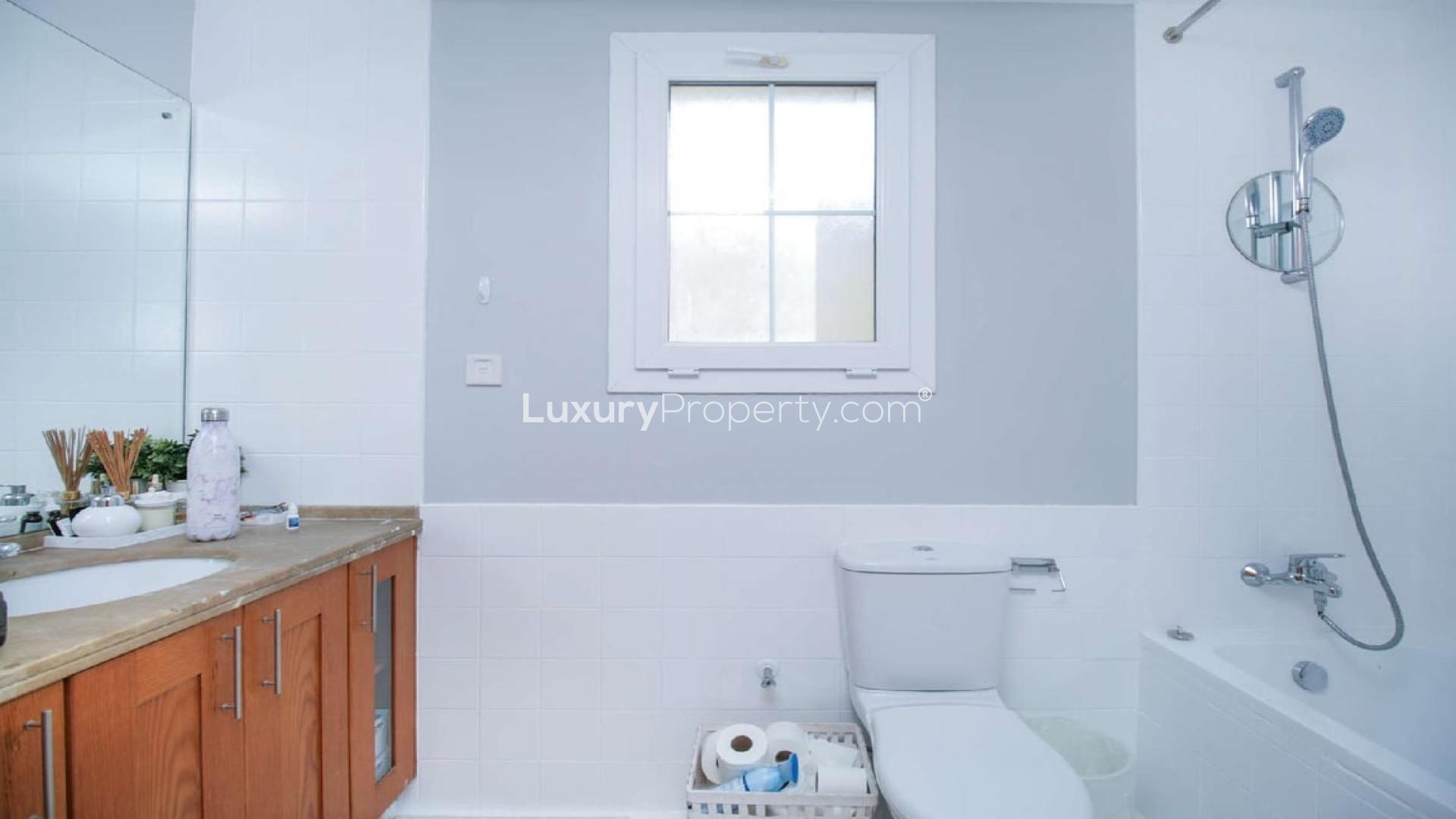 Stylish living room in Al Reem villa with modern decor and natural light