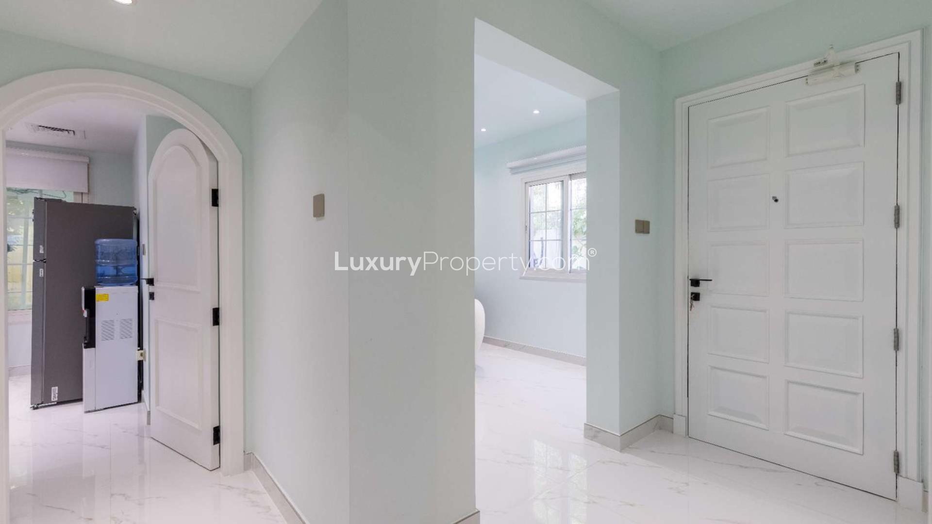 Exterior view of upgraded 2-bedroom villa in Springs 12, The Springs community