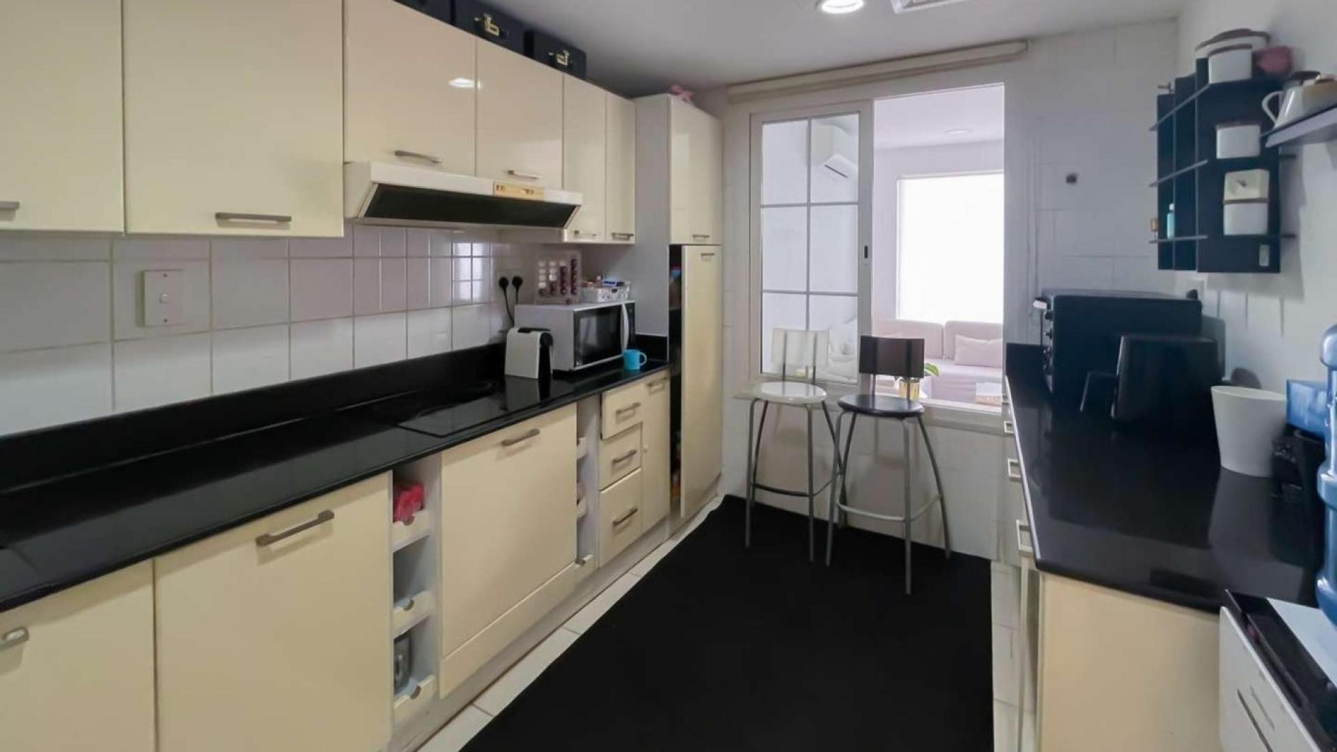 Upgraded villa garden with seating area in Springs 12, ideal for outdoor relaxation