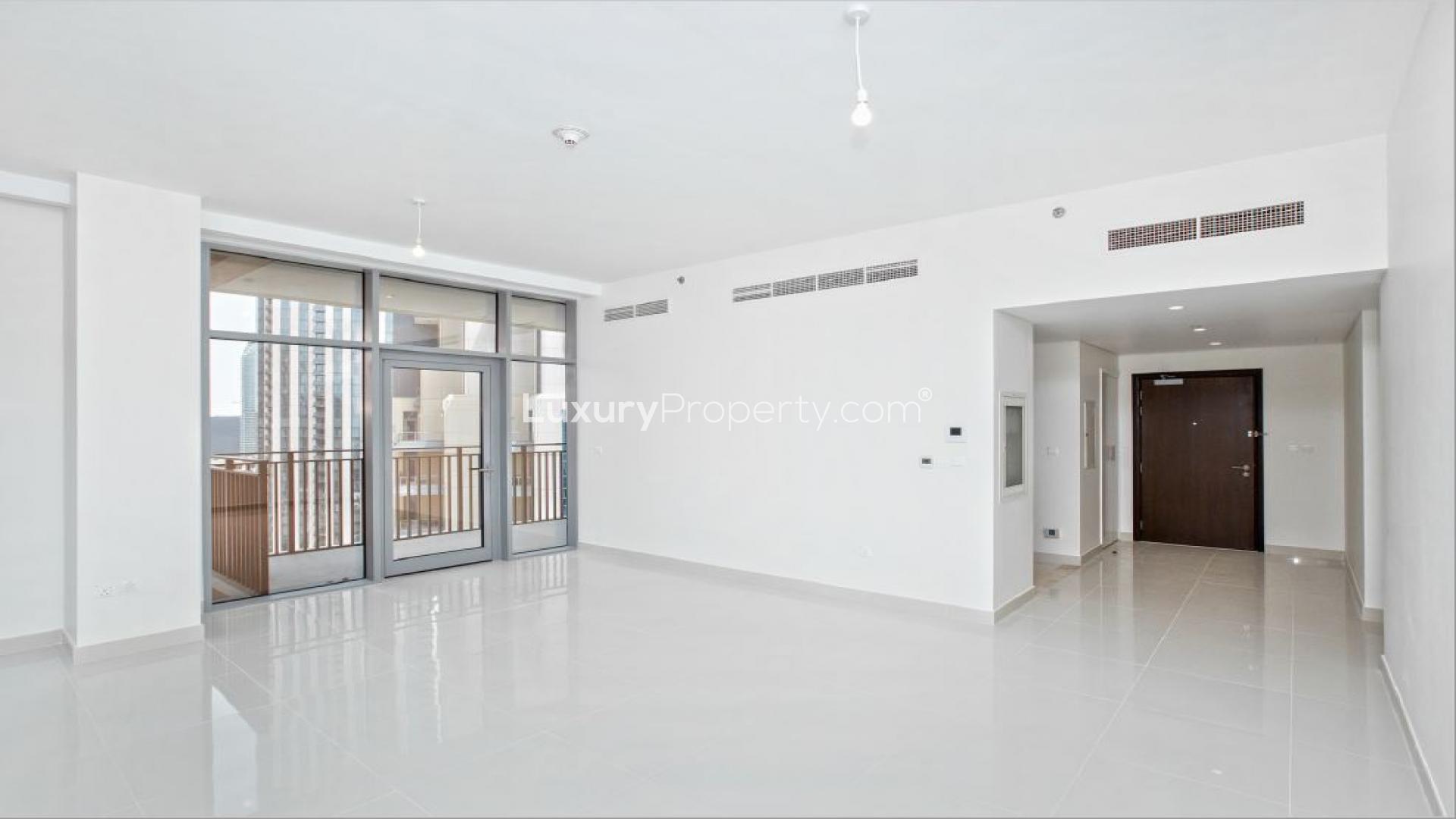 Skyline view of Downtown Dubai from Boulevard Crescent apartment, featuring modern skyscrapers and construction