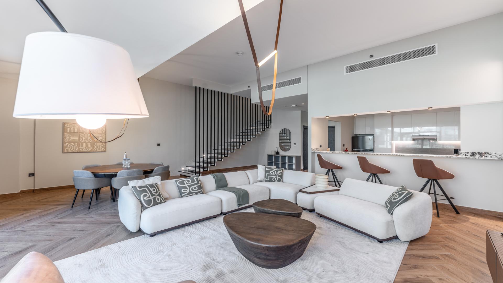 Furnished living area with modern decor in Dubai Marina Moon apartment, Dubai Marina