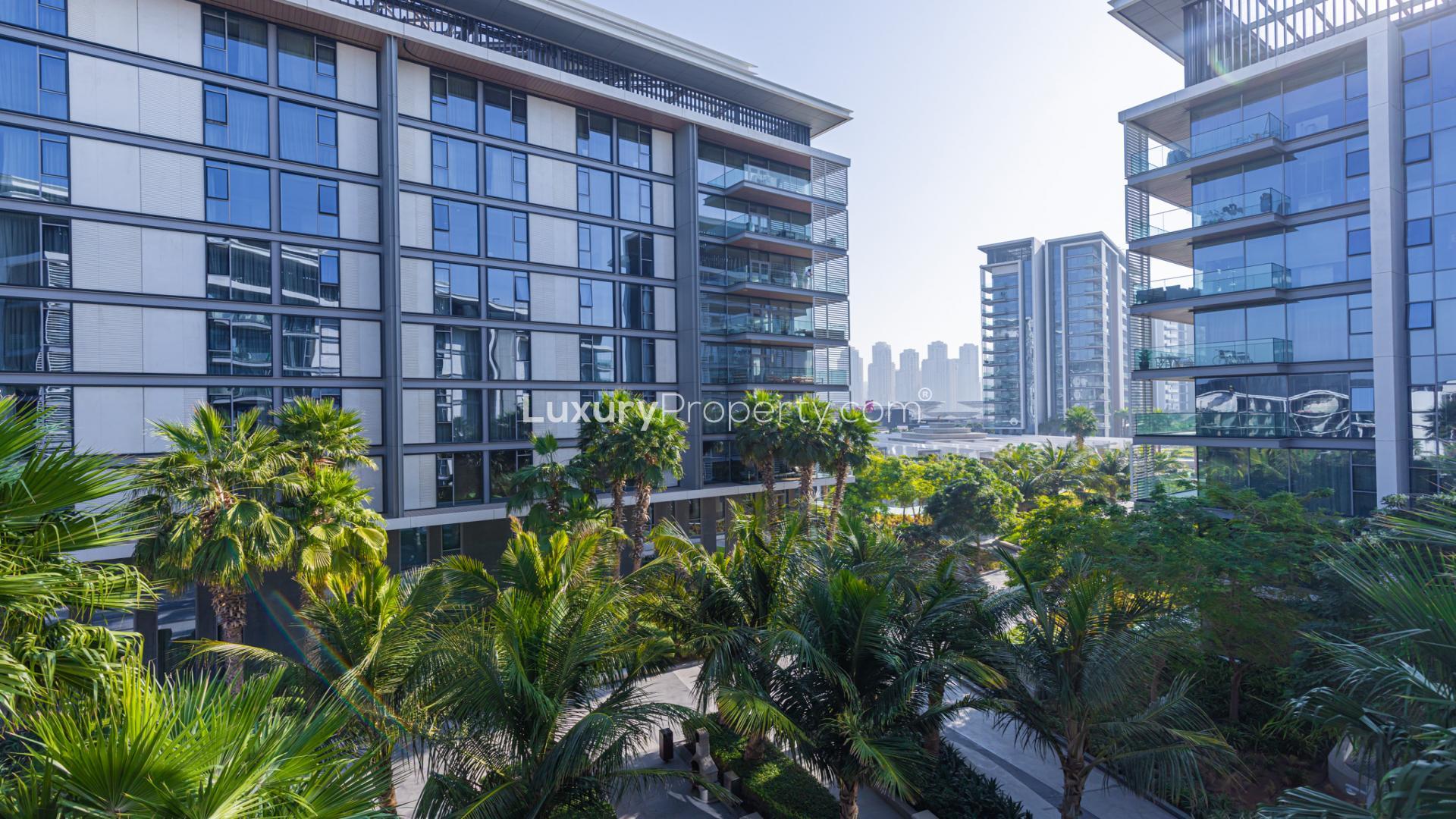 Dining area in Bluewaters Residences apartment with modern decor and balcony view