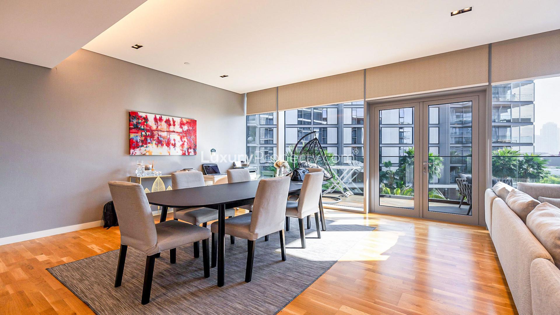 Lavish Bluewaters apartment living room with sea view, modern furniture, and natural light