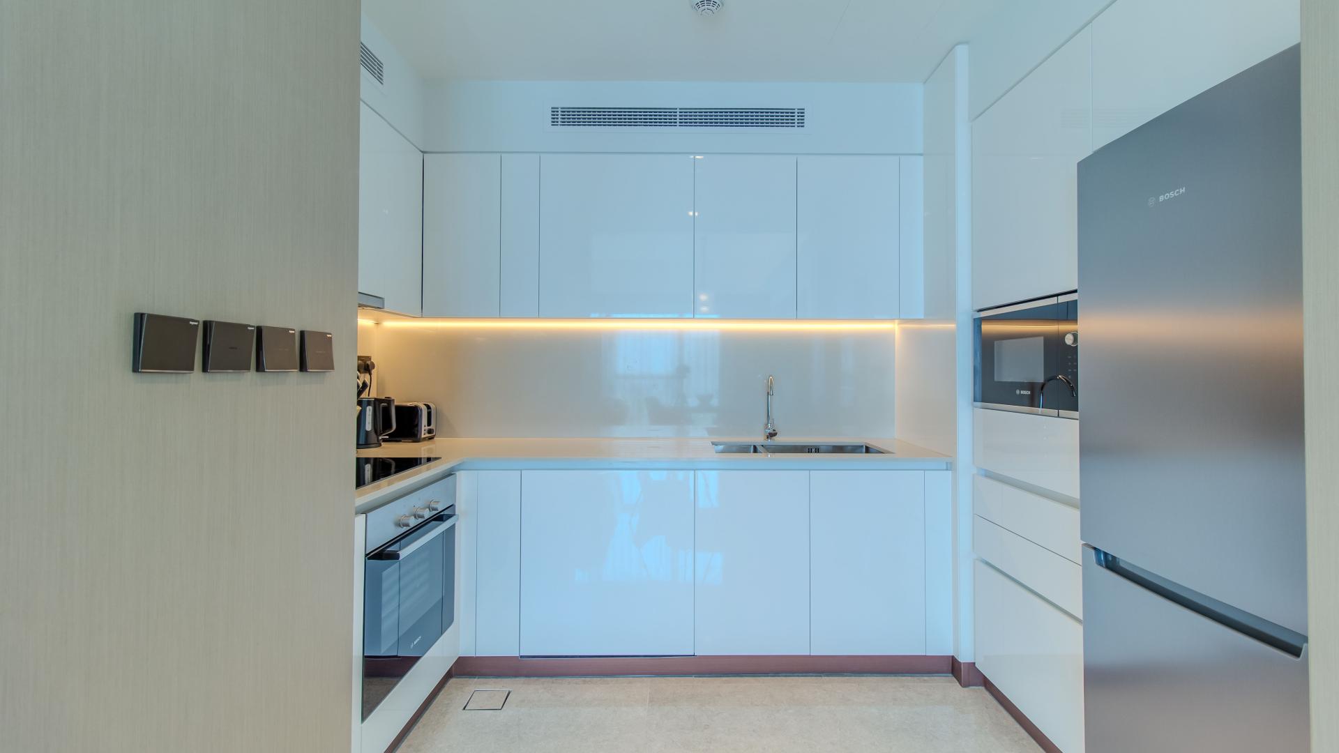 "Modern workspace in 2-bed apartment, Address Harbour Point Tower 1, Dubai Creek Harbour.",Modern bedroom in Address Harbour Point Tower 1, Dubai Creek Harbour apartment for rent