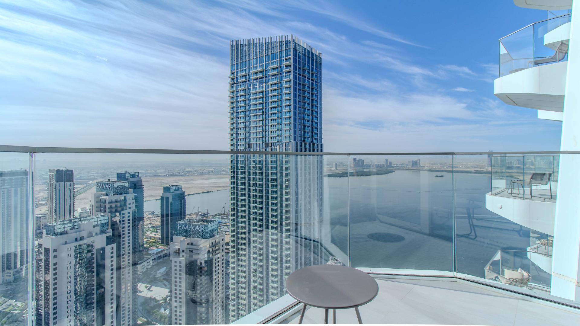 "Stunning Dubai Creek Harbour view from Address Harbour Point Tower 1 apartment balcony.",Modern kitchen in Address Harbour Point Tower 1, Dubai Creek Harbour apartment for rent