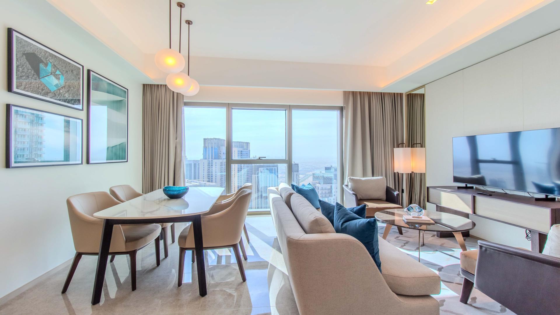 "Stunning view from Address Harbour Point Tower 1 apartment, Dubai Creek Harbour skyline.",Modern living room in 2-bed apartment, Address Harbour Point Tower 1, Dubai Creek Harbour