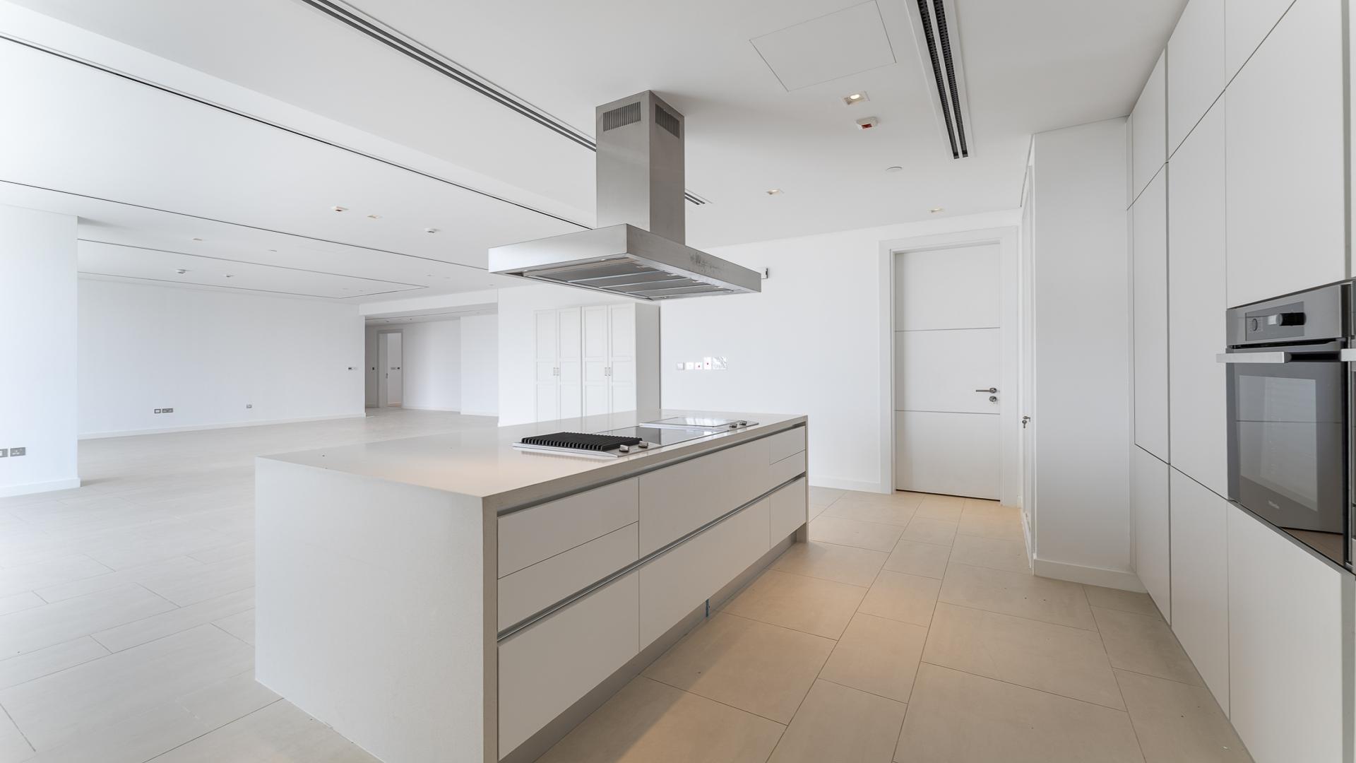 Spacious open-plan kitchen and living area in Seventh Heaven, Al Barari apartment for rent