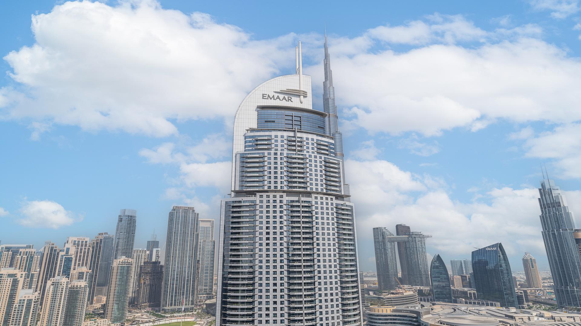 Fully furnished living room in Boulevard Point apartment with city view, Downtown Dubai