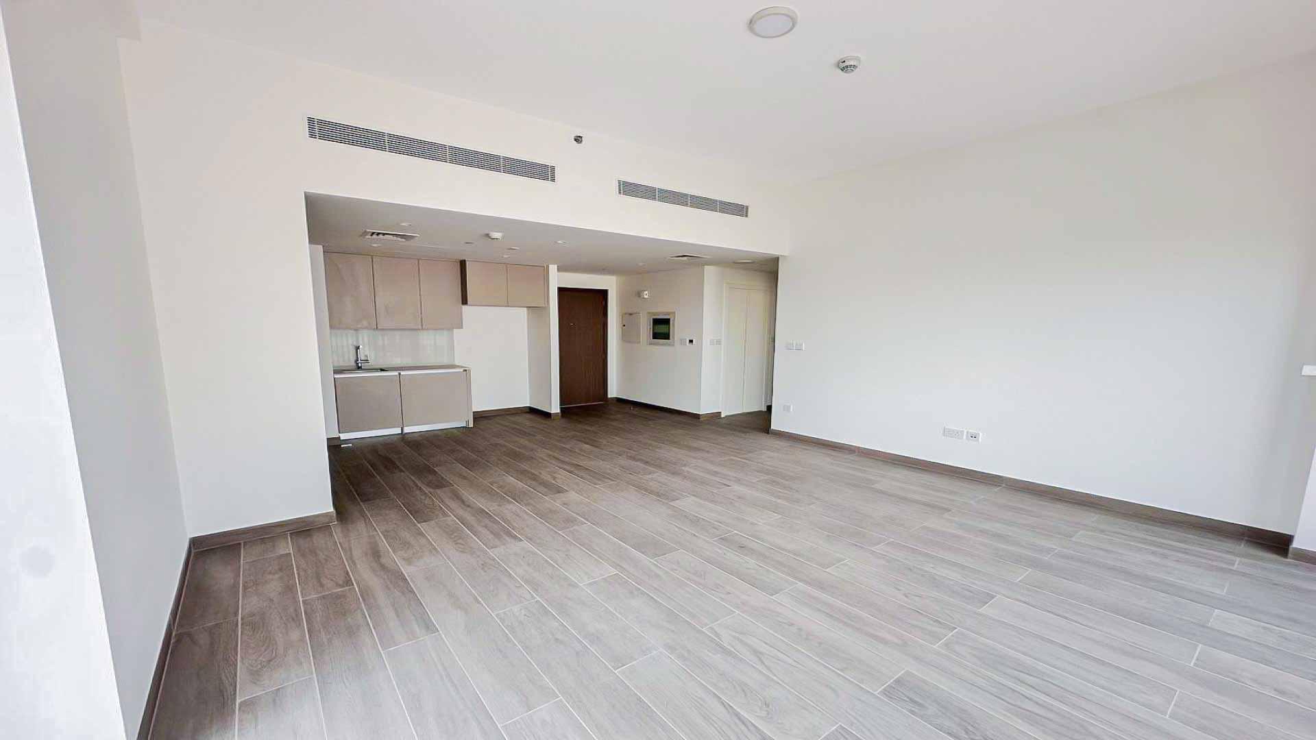 Spacious living area in 2-bedroom apartment, Creek Beach, Dubai Creek Harbour, large windows, modern design