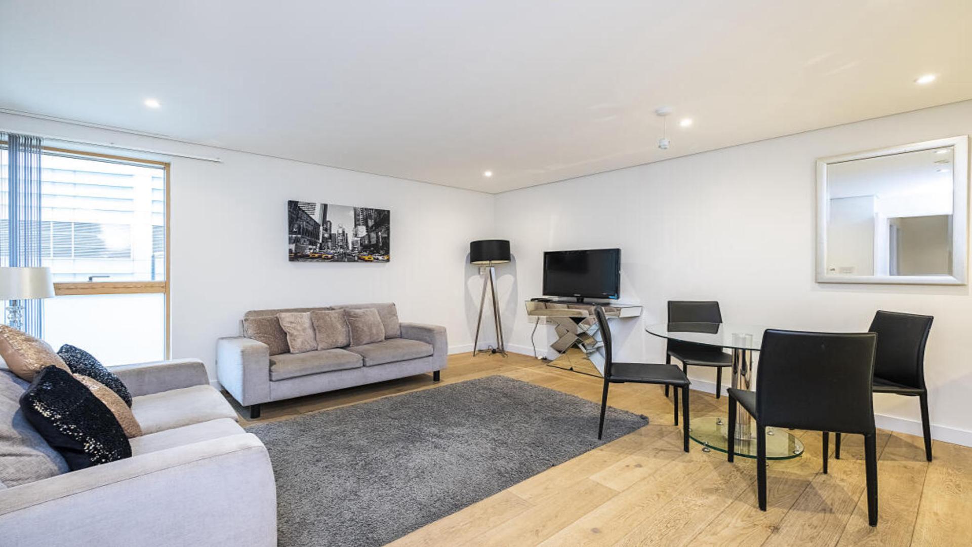 Modern kitchen and living area in two-bedroom apartment, 4 Merchant Square, London