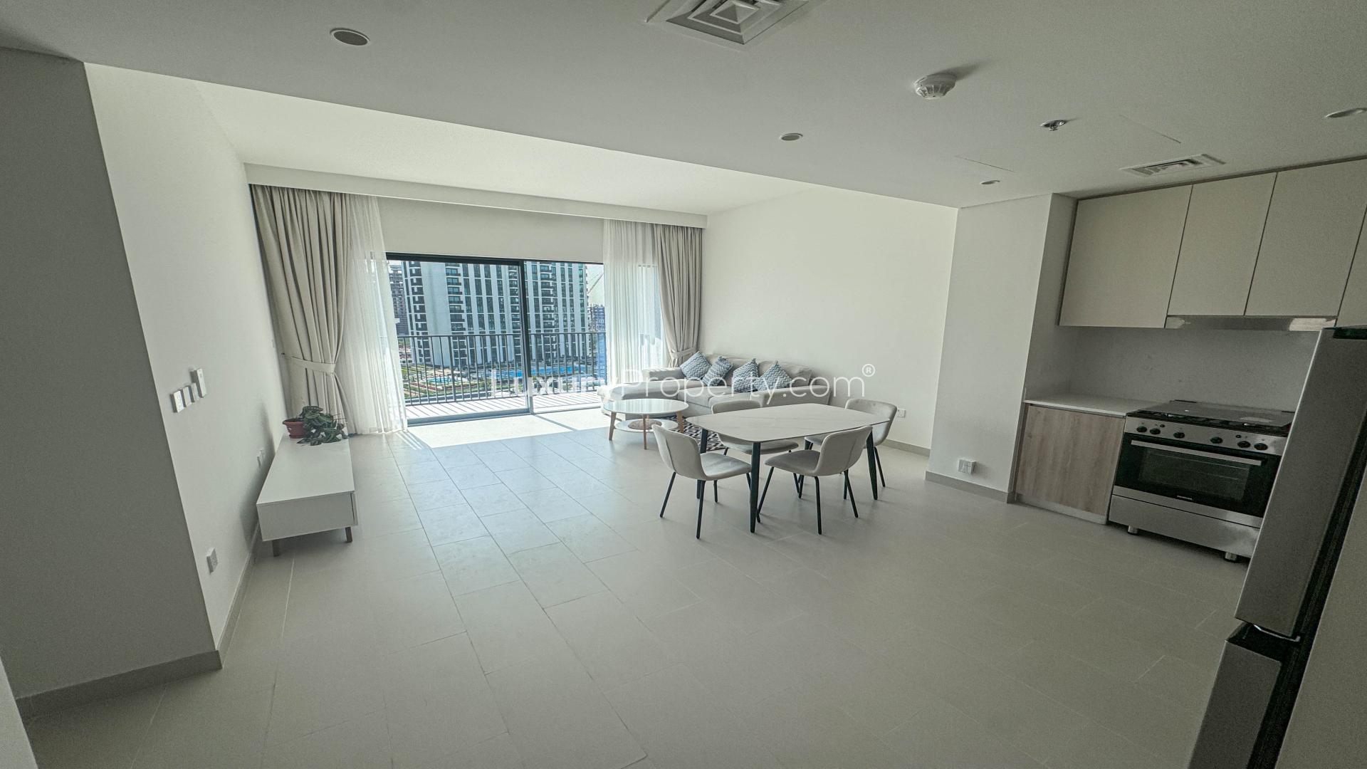 Aerial view of Park Field Tower 1 apartment complex with pools, Dubai Hills Estate