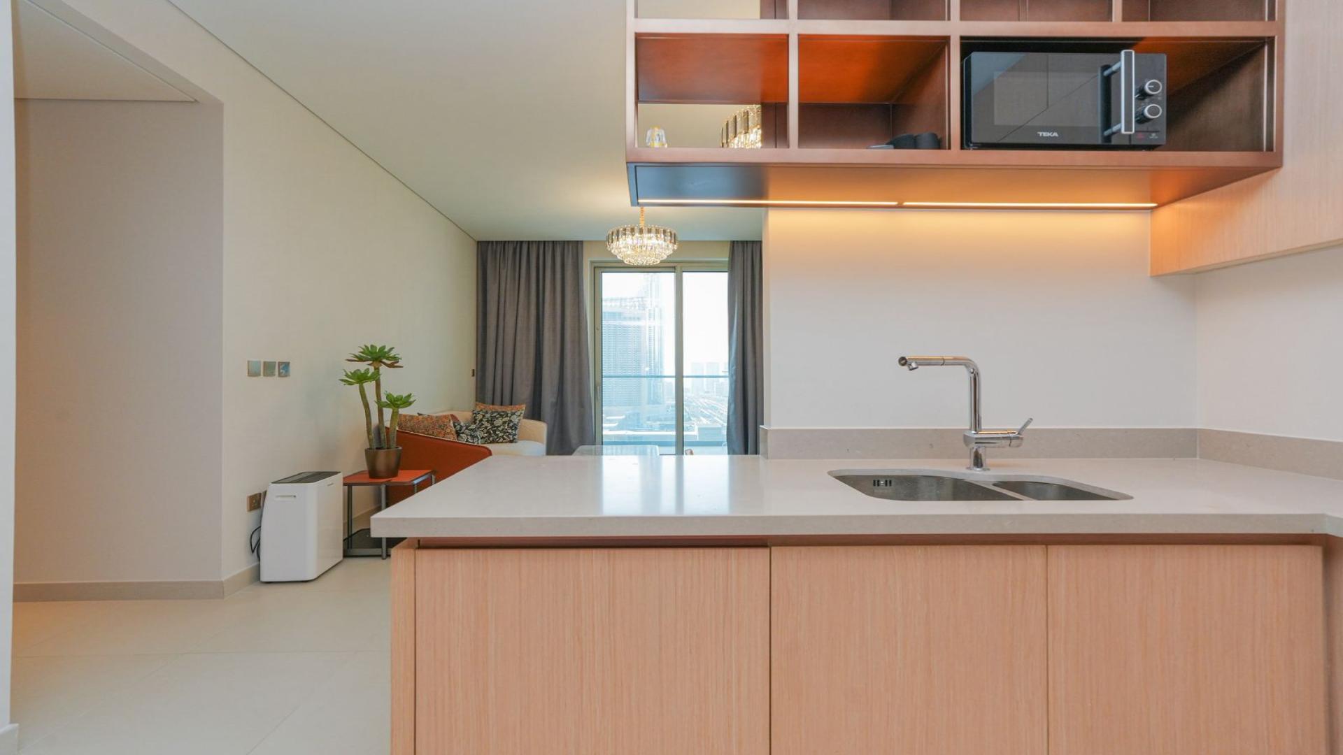 Modern bathroom in two-bedroom apartment, The Opus, Burj Khalifa community, available for rent