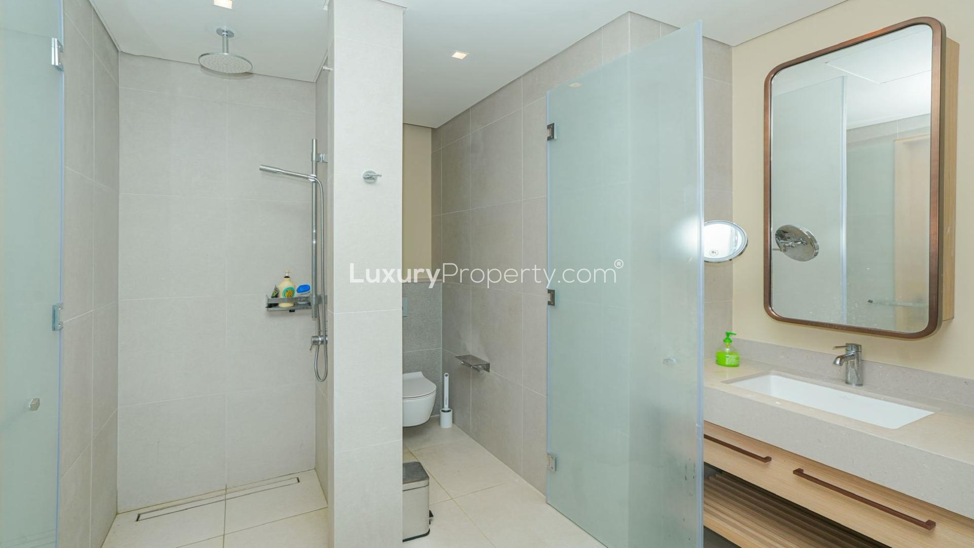 Modern bedroom in The Opus apartment, Burj Khalifa community, with ensuite bathroom and stylish decor