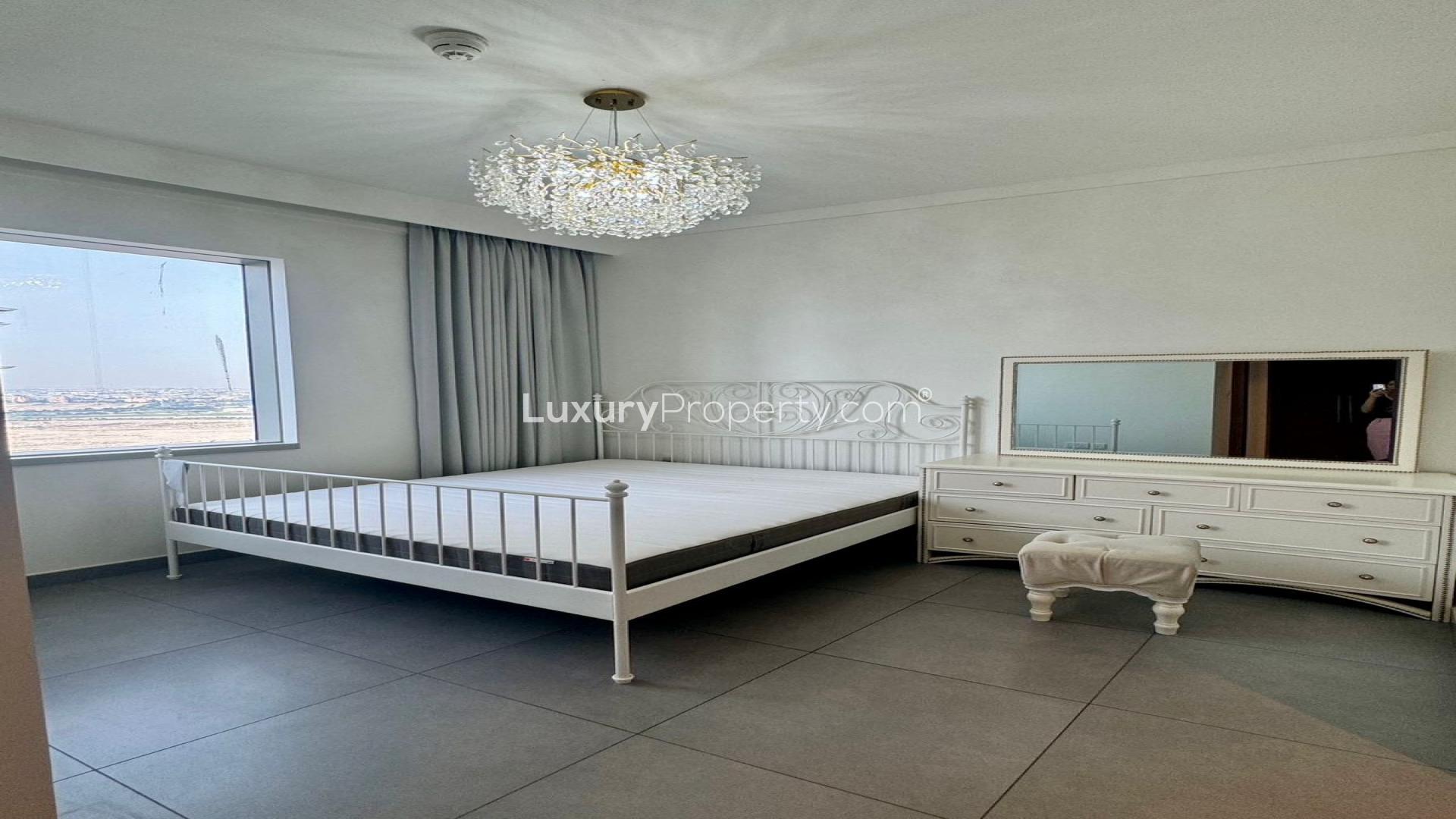 Modern living room in Creek Gate Tower 2 apartment, Dubai Creek Harbour, with city view