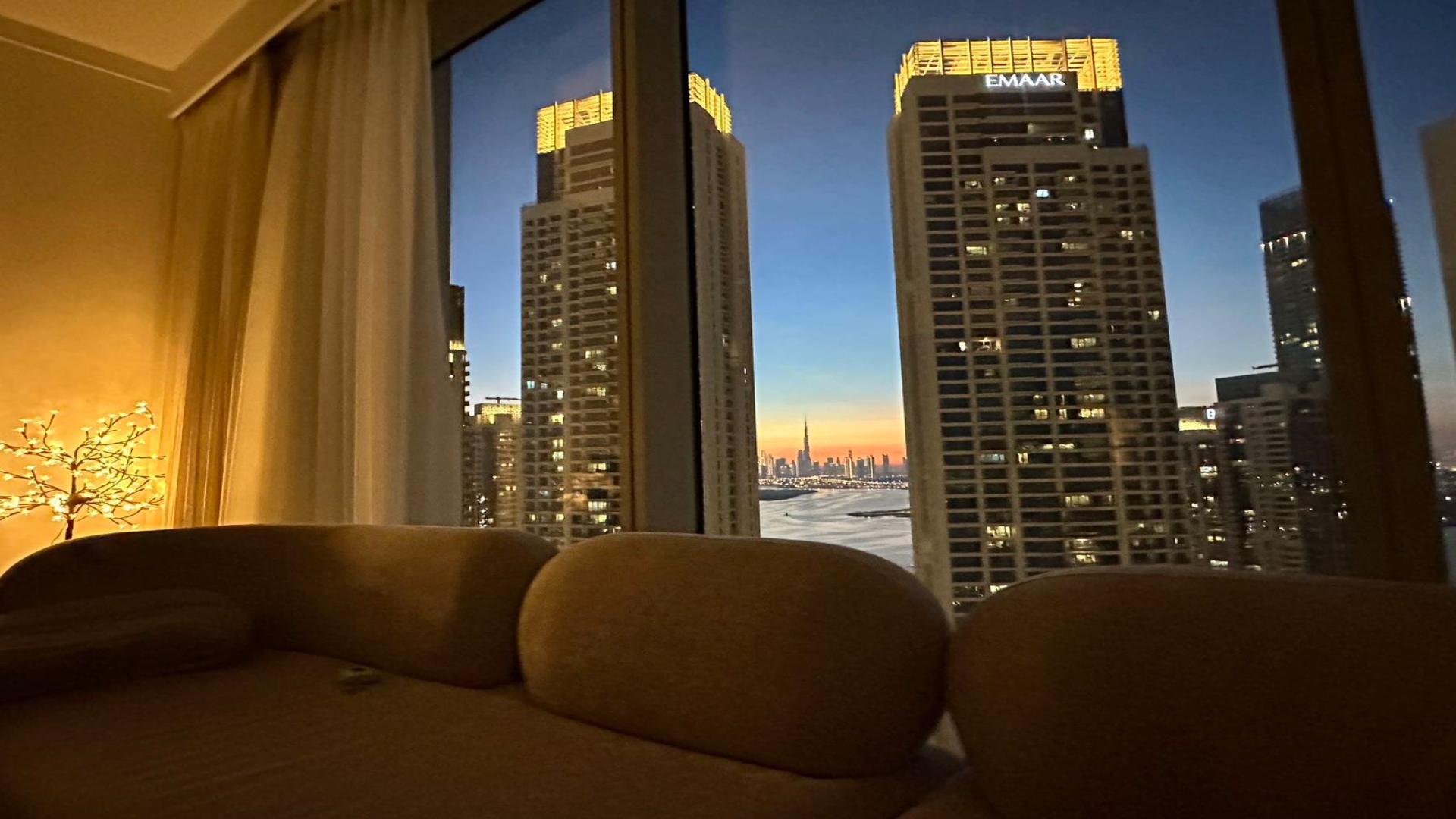 Stunning night view from Creek Gate Tower 2 apartment, Dubai Creek Harbour skyline