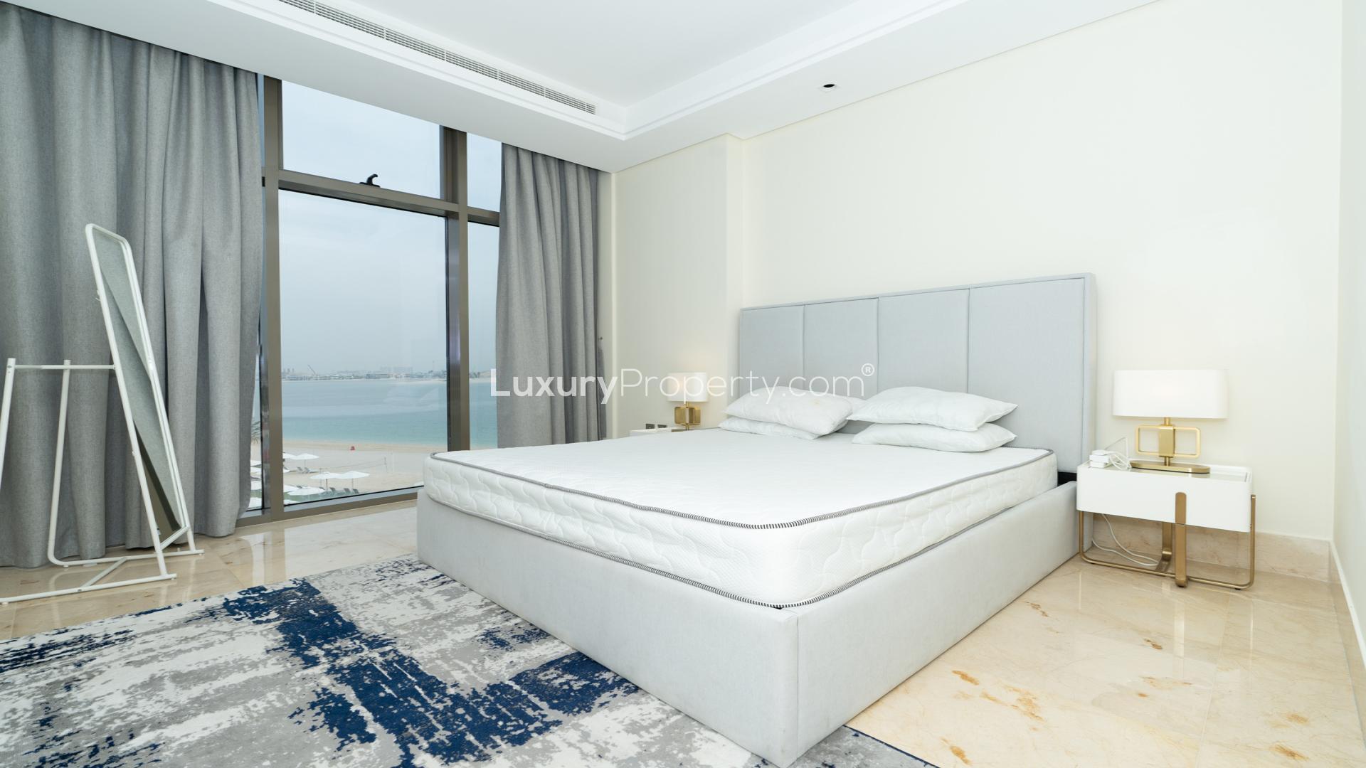 Modern open-plan living area in Palm Jumeirah apartment with sea view, The 8