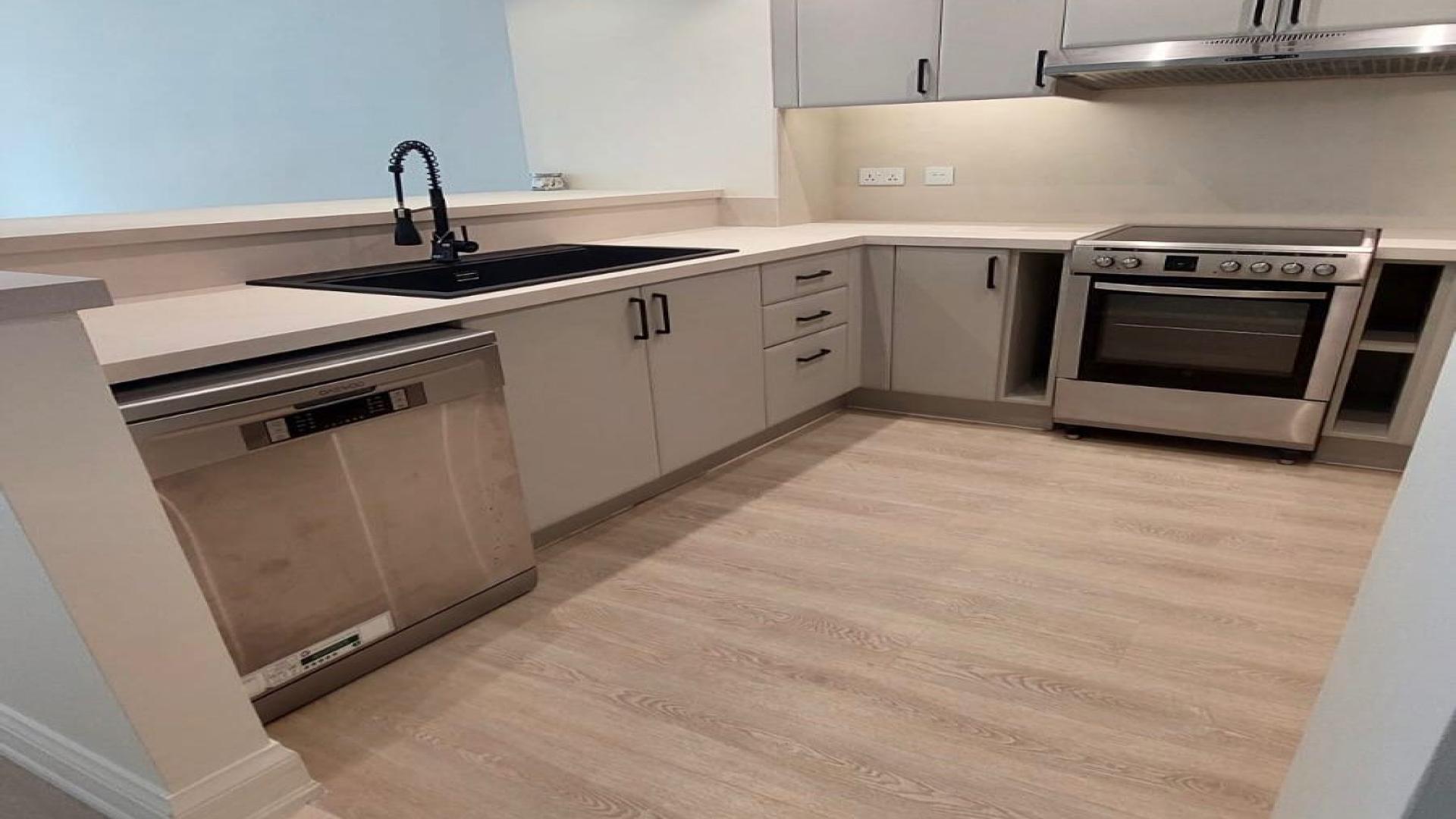 Modern kitchen in two-bedroom apartment, Al Yass Tower, Dubai Marina, featuring stainless steel appliances