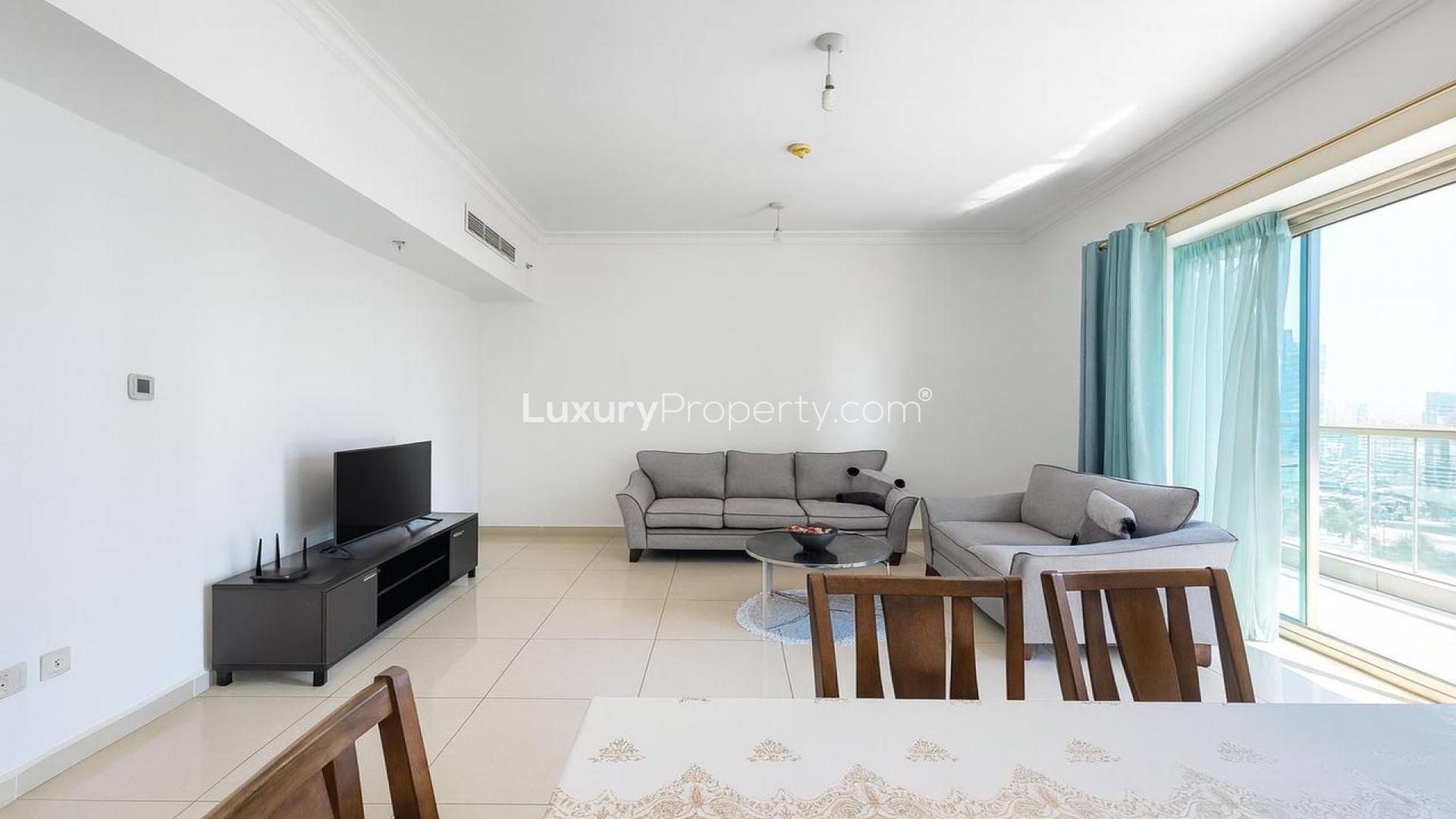 High-rise view from JLT apartment, overlooking cityscape and roads, Lake View community