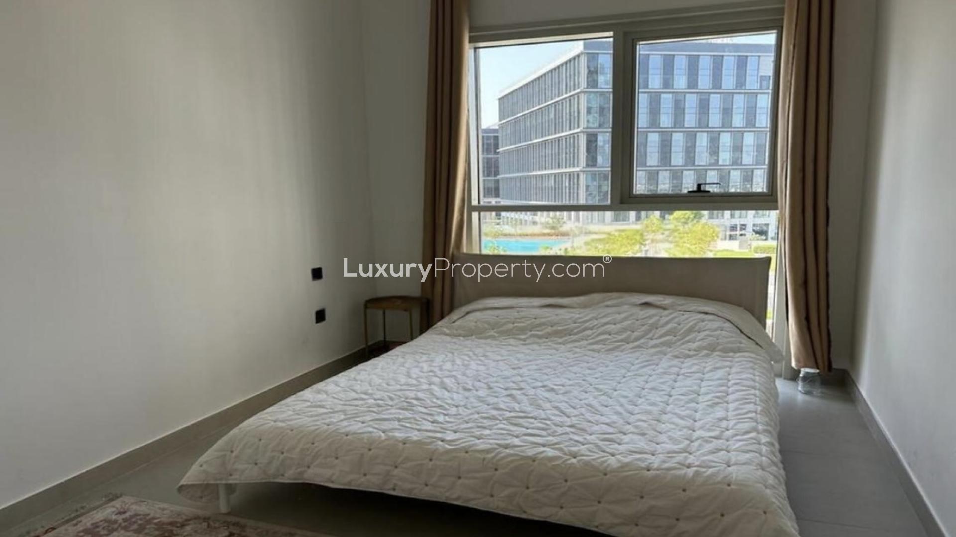 Modern living room in Dubai Hills Estate apartment, Collective 2.0 Tower A, with glass partition