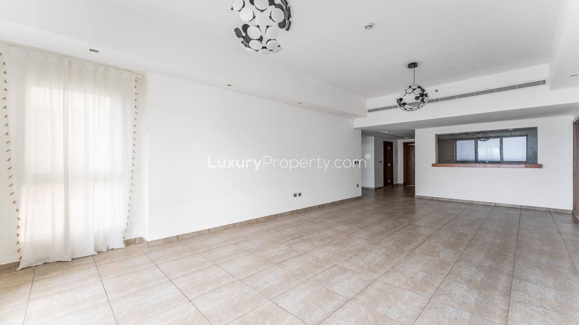 Empty living room in Marina Residences 6 apartment, Palm Jumeirah, for rent, spacious layout