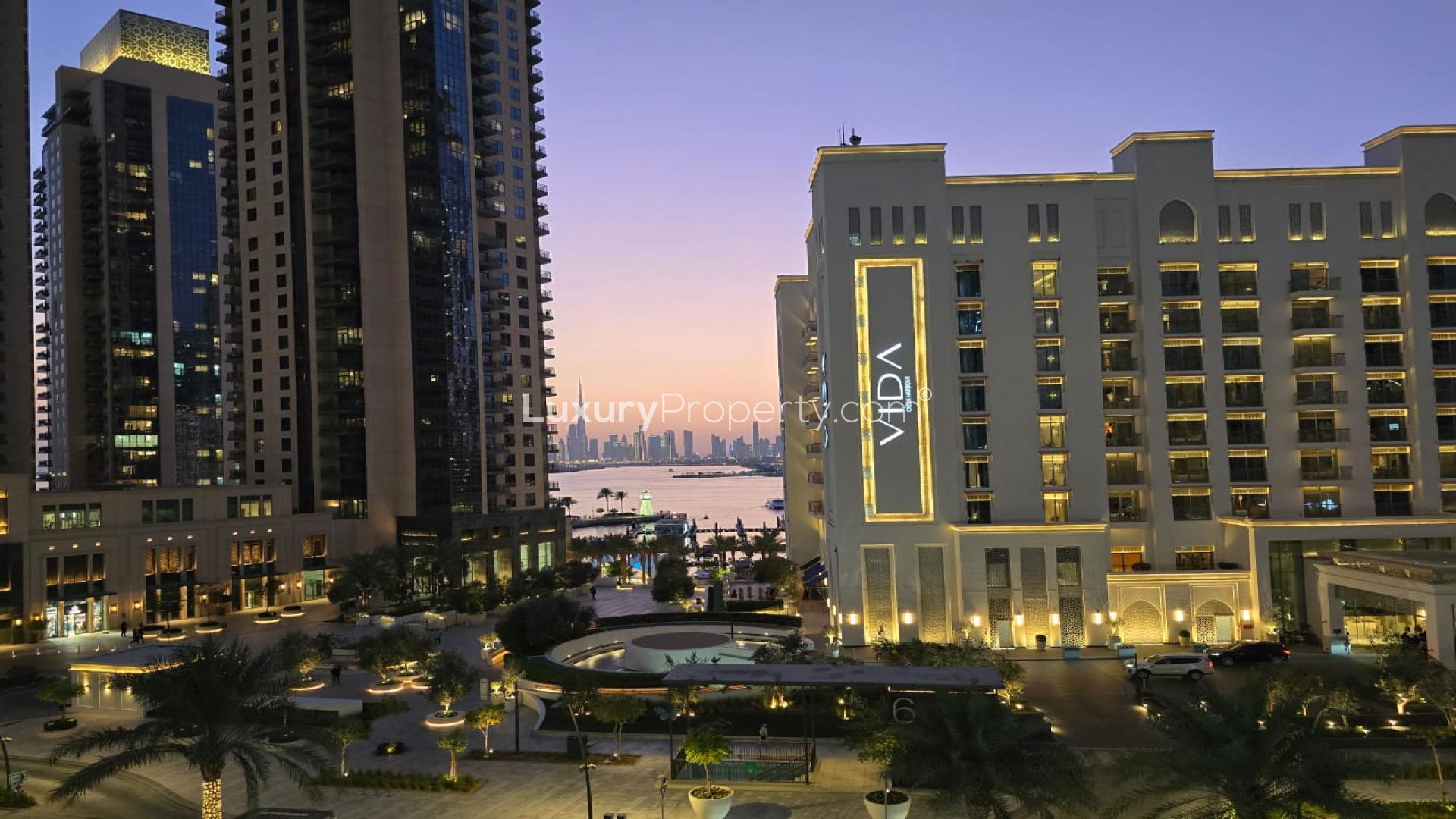 Modern kitchen and living area in unfurnished 2-bedroom apartment, Dubai Creek Harbour