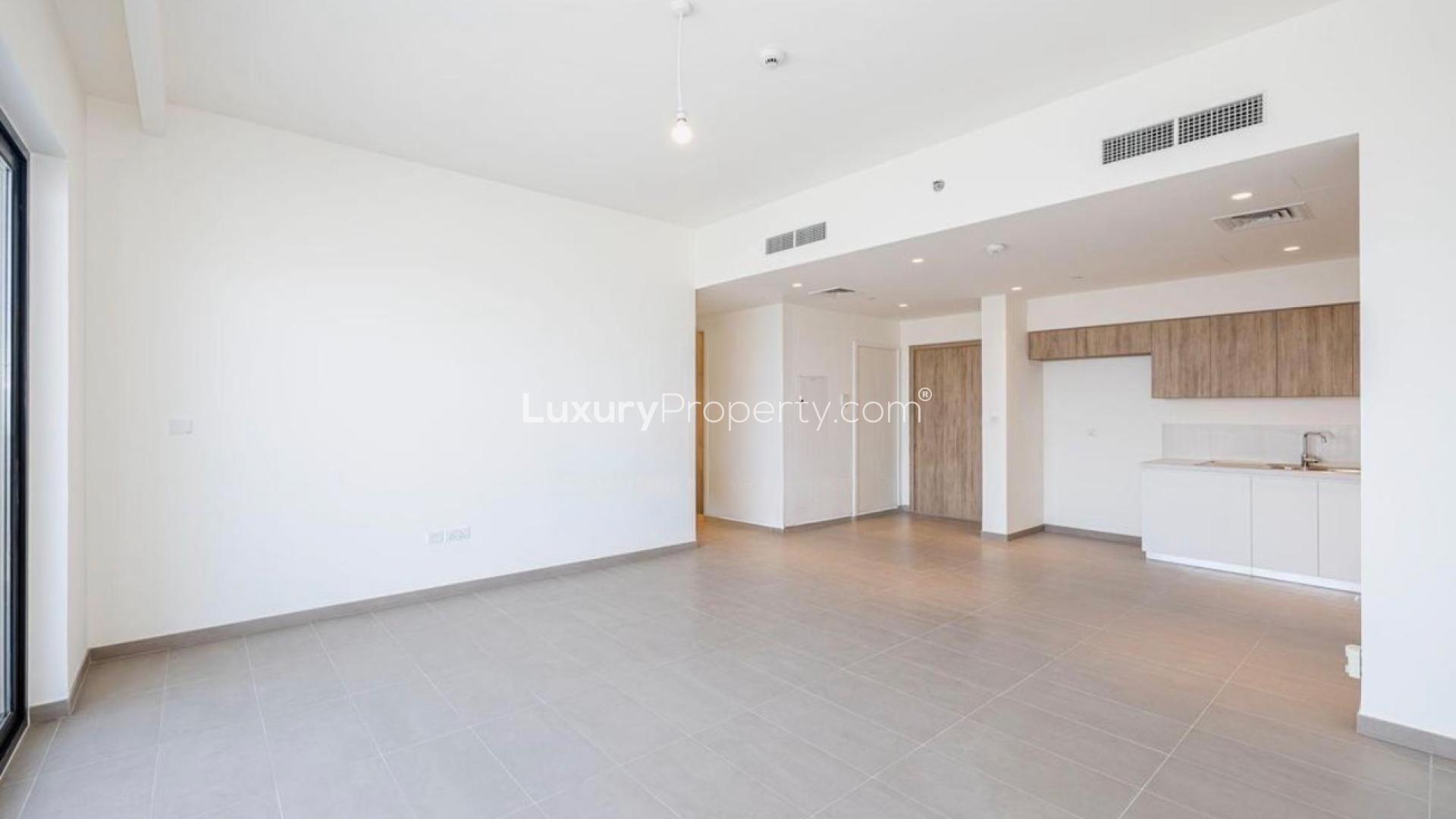 Modern kitchen and living area in 2-bedroom apartment, Park Ridge Tower C, Dubai Hills Estate