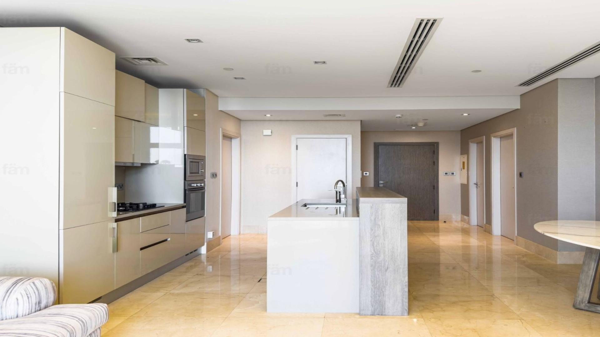 Modern kitchen and dining area in Palm Jumeirah apartment for rent, The 8 community