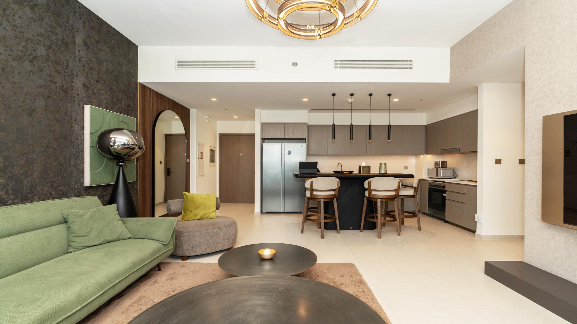 Modern open-plan living area in Grande Signature Residences apartment, Downtown Dubai, for rent