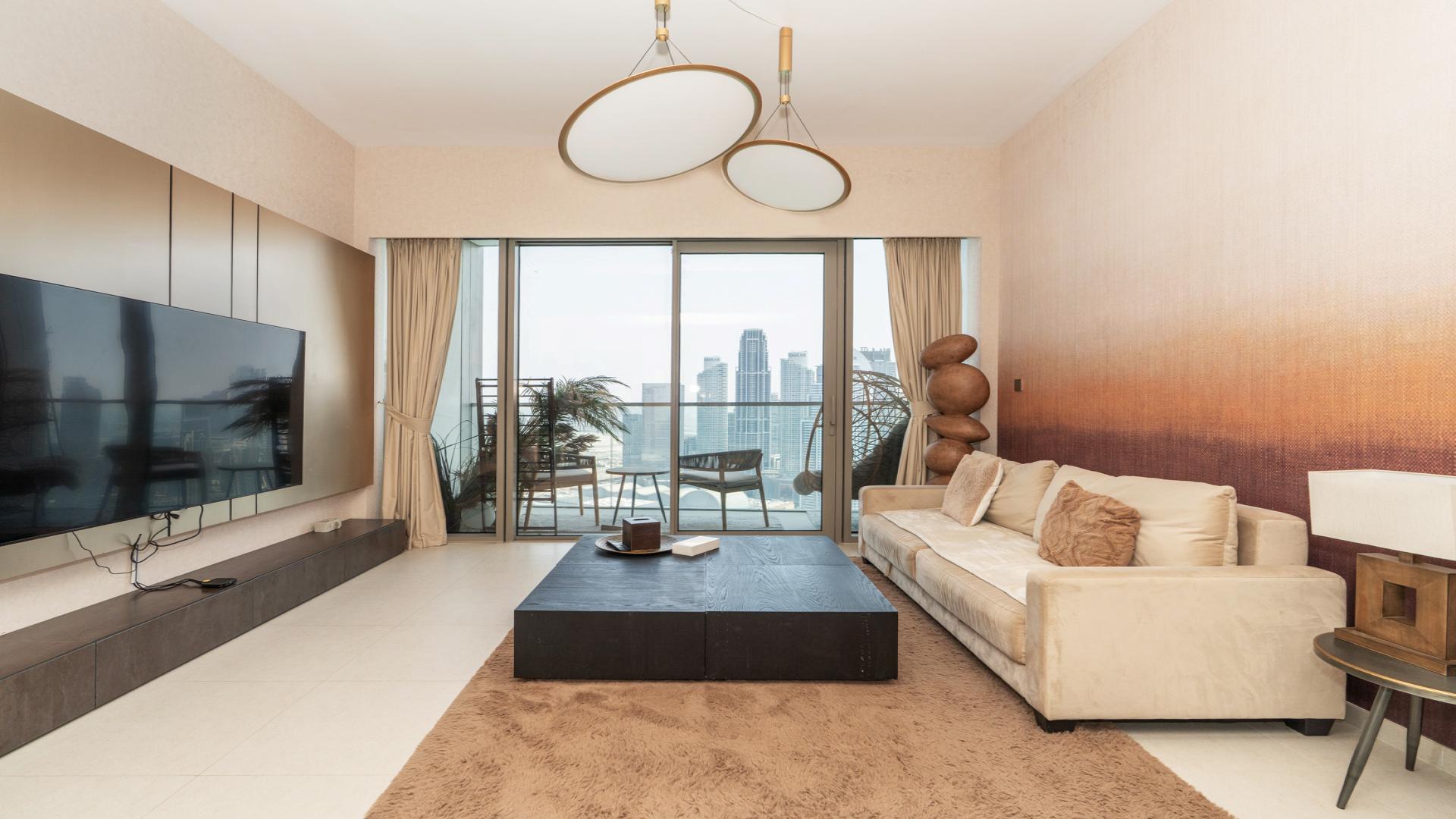 Balcony view from Grande Signature Residences, Downtown Dubai, overlooking city skyline and fountain