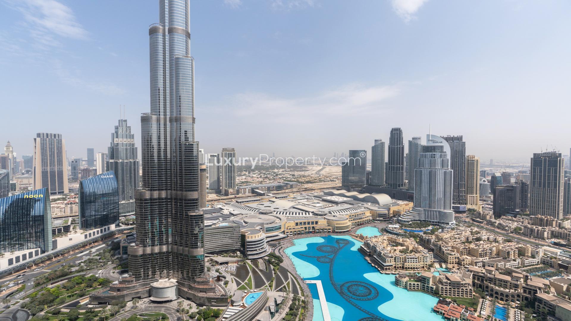 Aerial view of Downtown Dubai near Grande Signature Residences, showcasing Burj Khalifa and Dubai Fountain