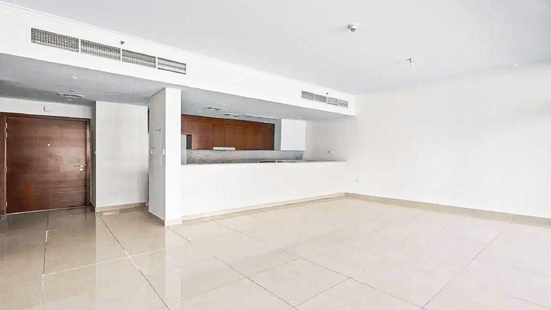 Empty apartment room with large window, pool view, Dubai Hills Estate, Mulberry 2