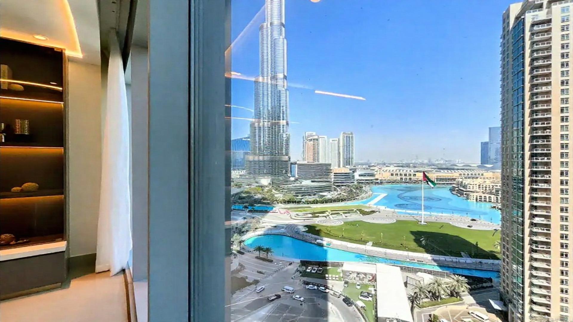 Spacious Opera Grand apartment living area with city view, Downtown, 2-bedroom rental