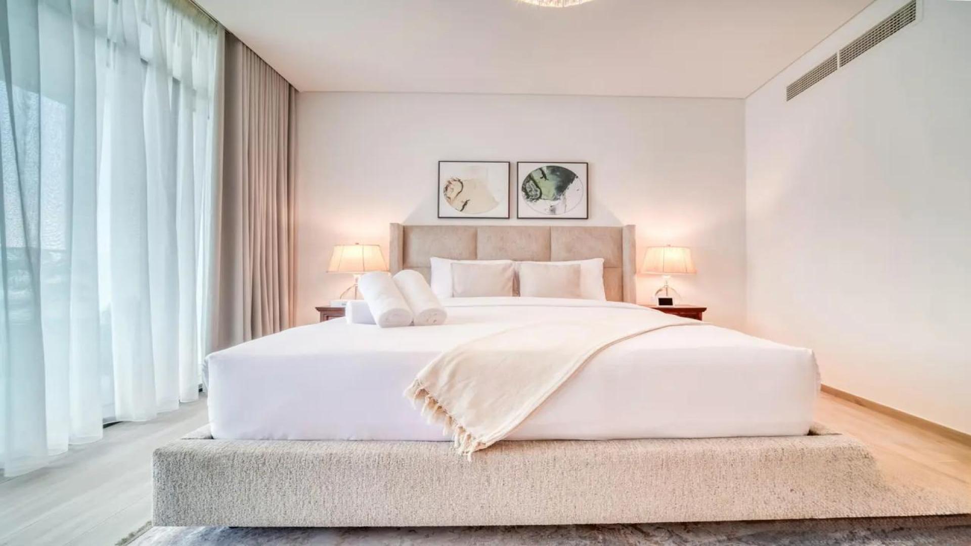 "Modern dining area with elegant decor in Dubai Creek Harbour apartment for rent.",Luxurious furnished bedroom in Address Harbour Point, Dubai Creek Harbour apartment for rent