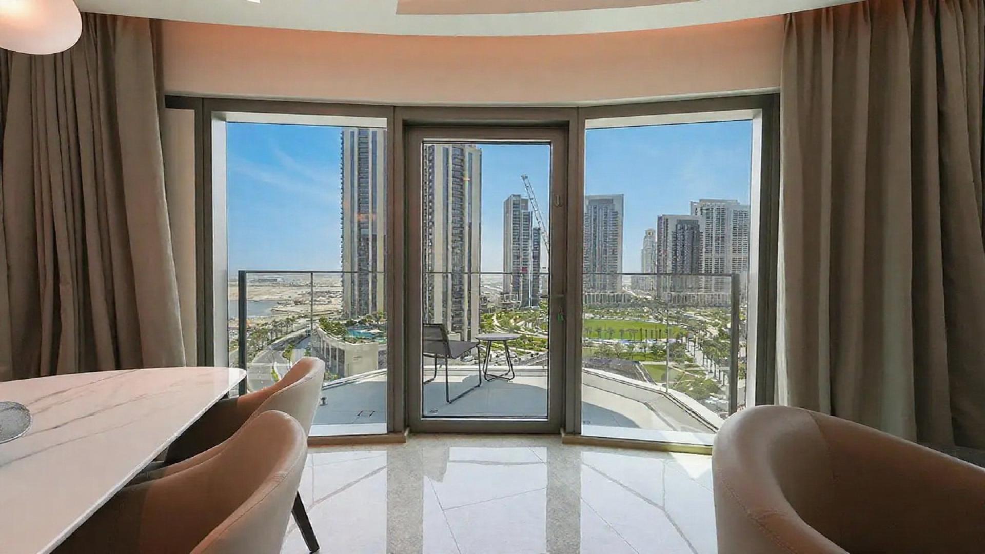 Modern kitchen and dining area in furnished 2-bedroom apartment, Address Harbour Point, Dubai Creek Harbour