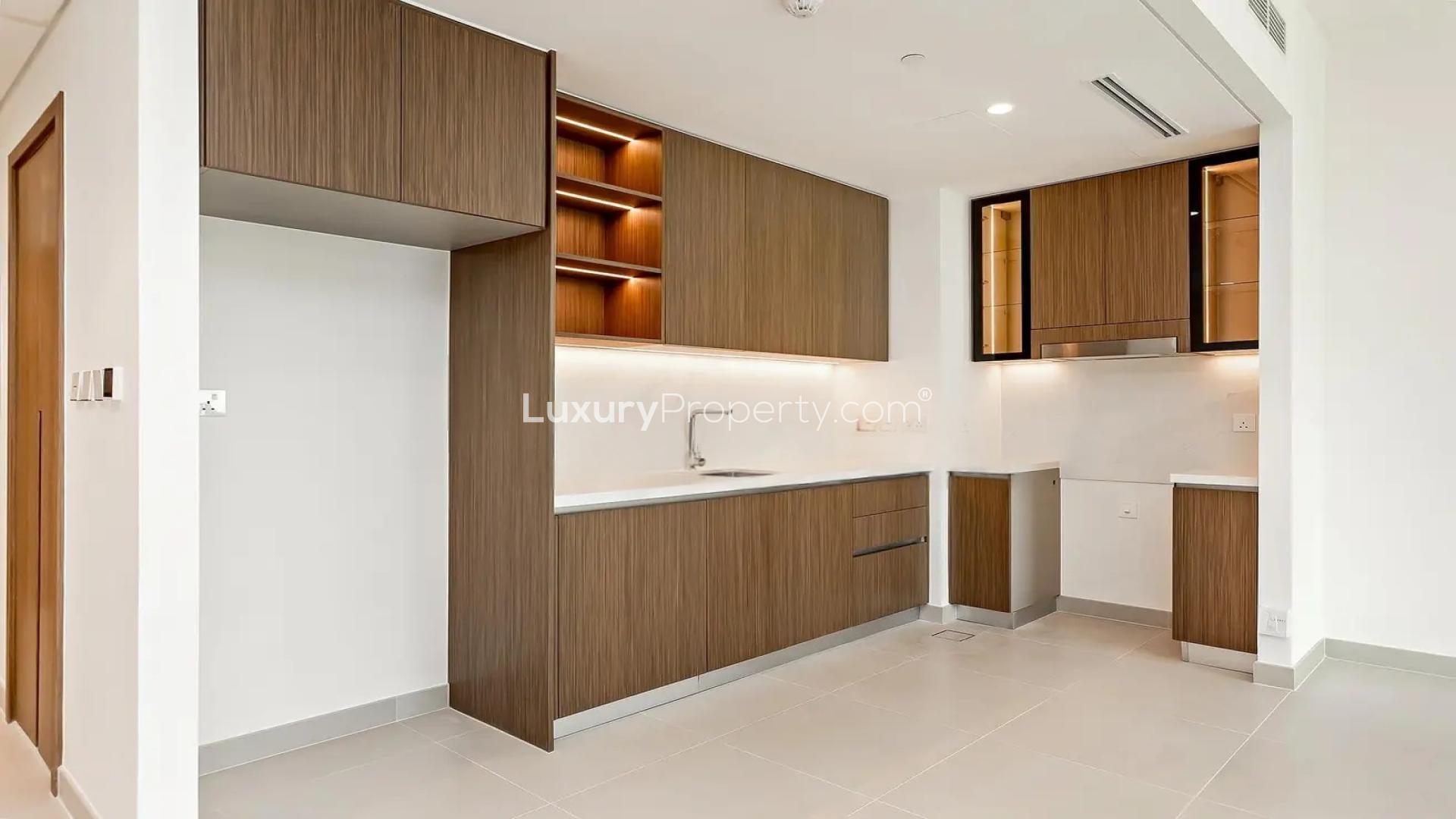 Mid-floor apartment view of Dubai Creek Harbour lagoon and modern skyline, Palace Residence North