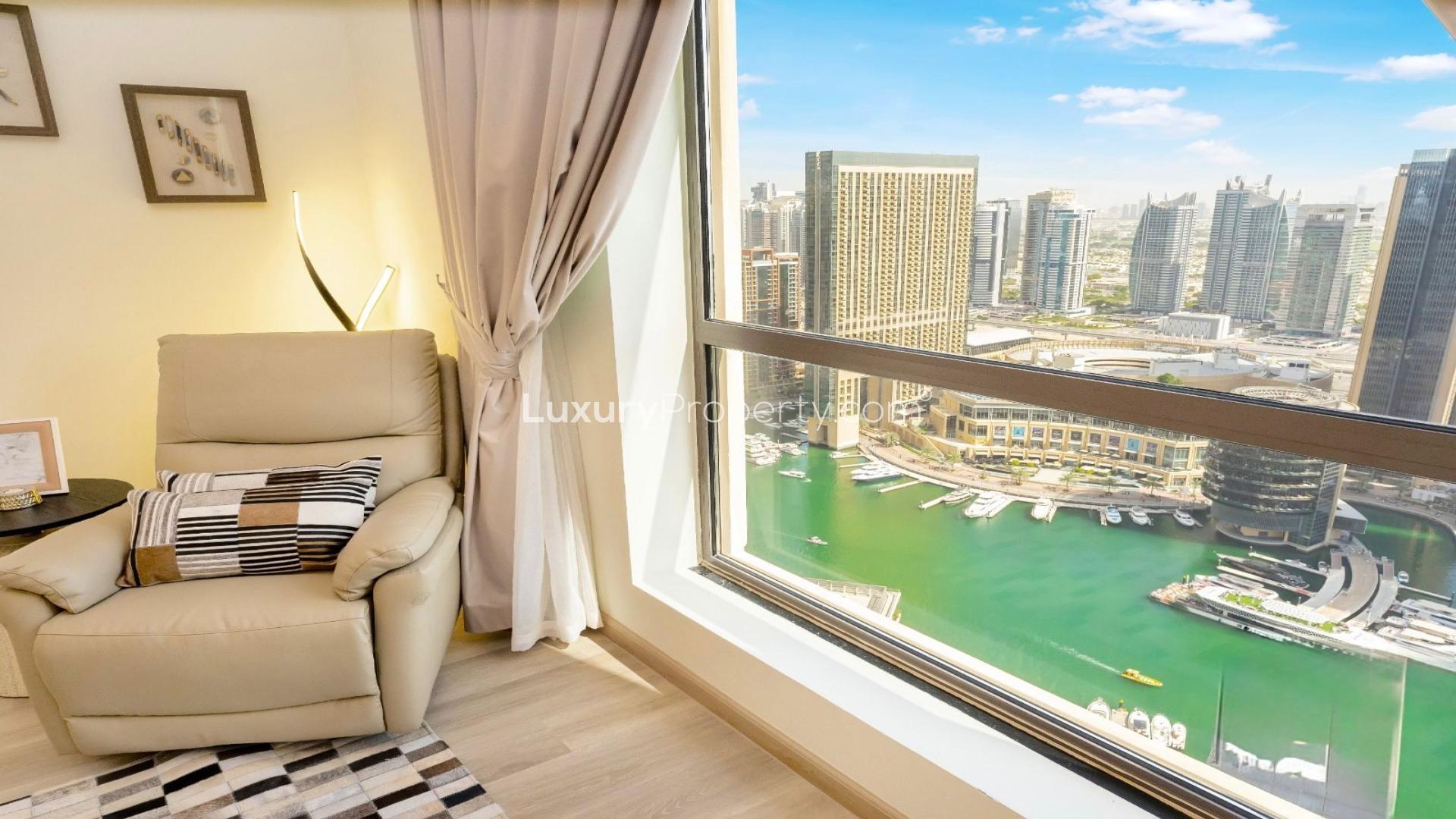 Luxurious JBR apartment living room with modern decor, cozy seating, and stylish lighting