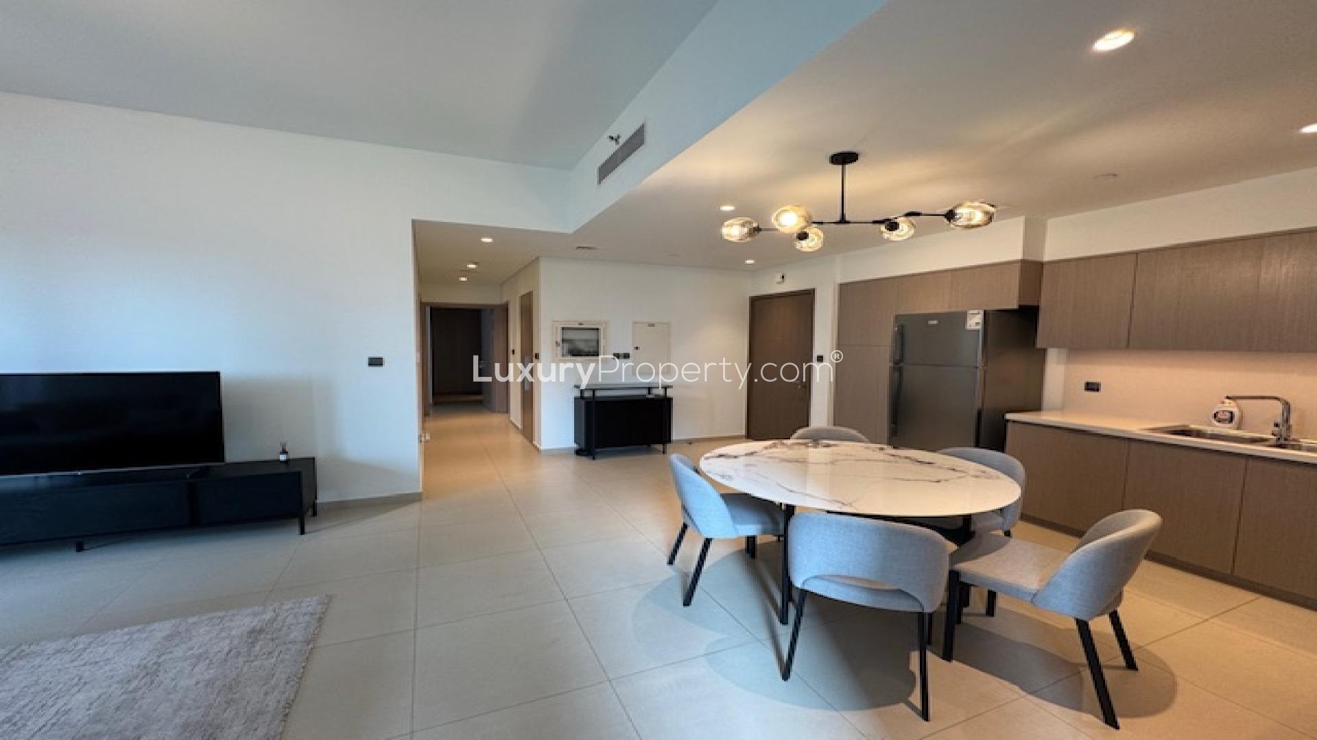 Modern open-plan kitchen and living area in Downtown Act Towers apartment for rent