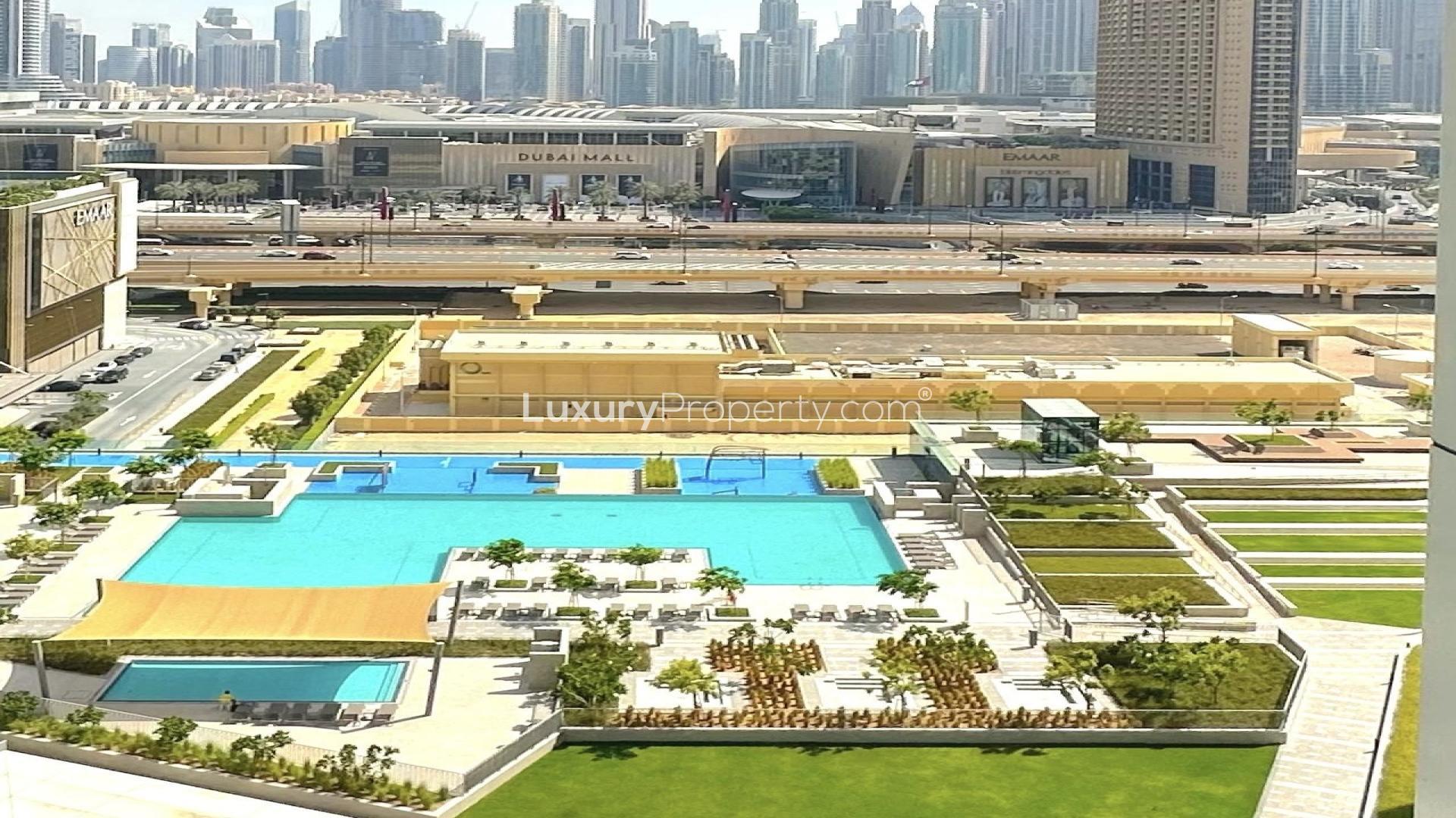 Modern living room in Downtown Dubai apartment, featuring elegant furnishings and large windows