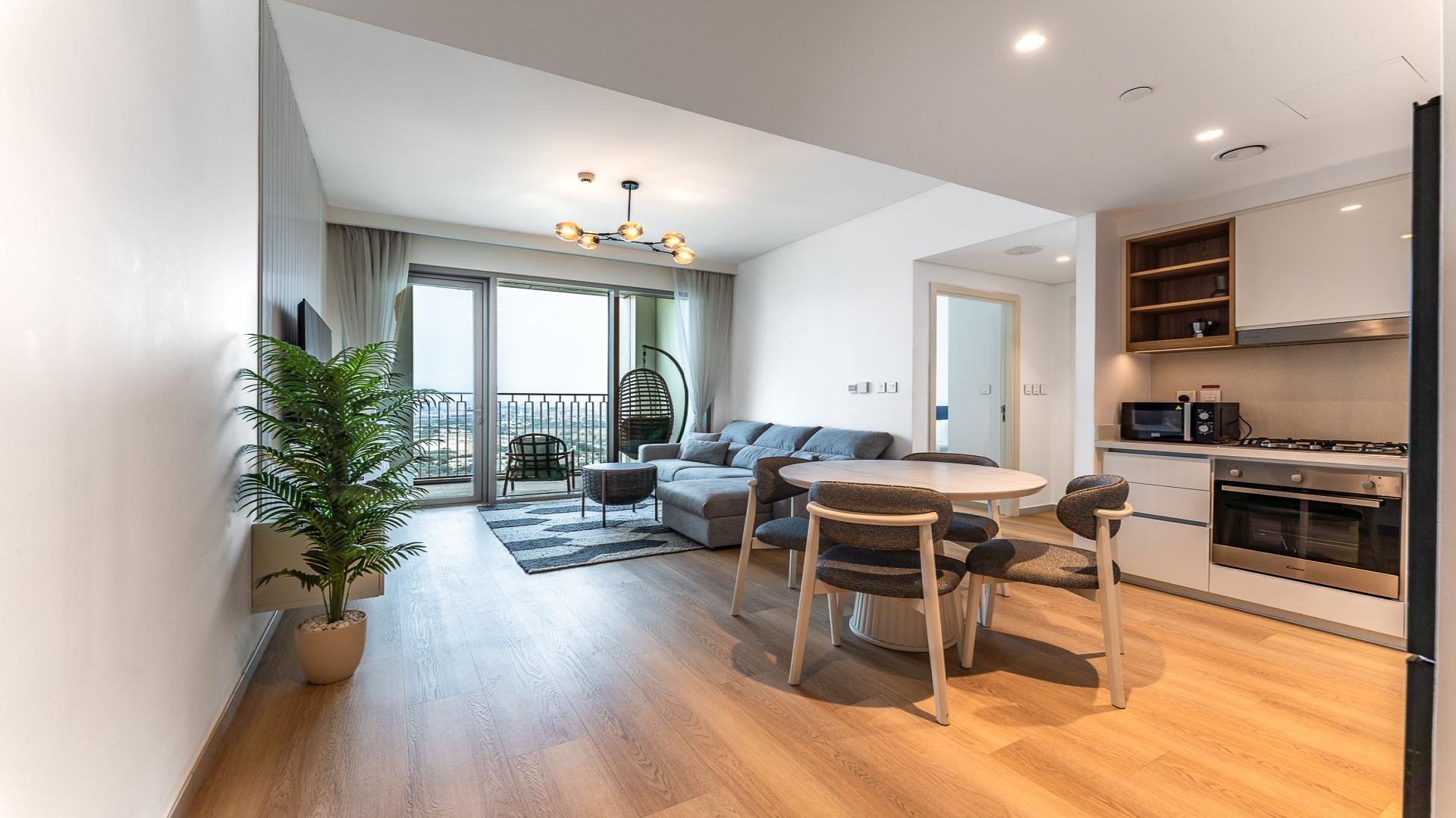 View of luxurious pool area at Downtown Views II Tower 2, Downtown Dubai apartment