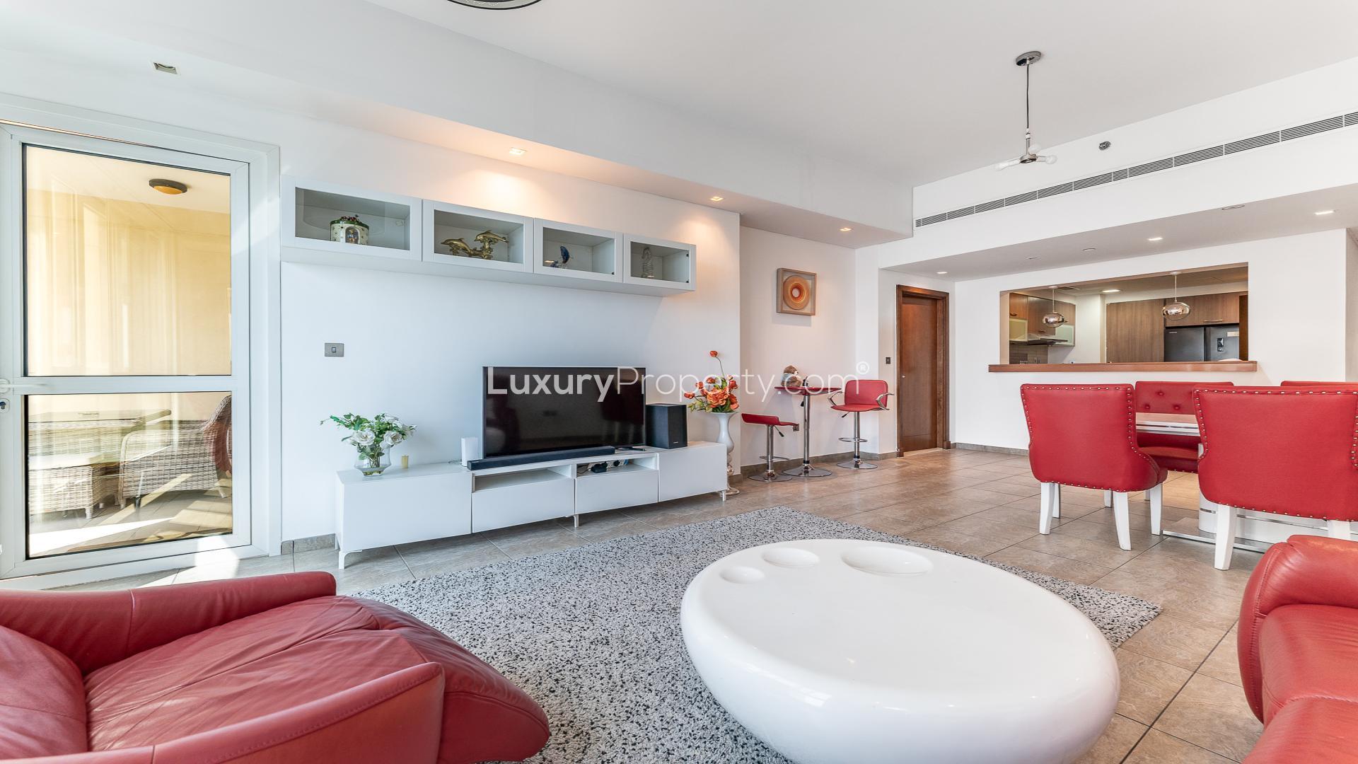 N/A,Furnished Palm Jumeirah apartment living room with red chairs and modern decor, Marina Residences