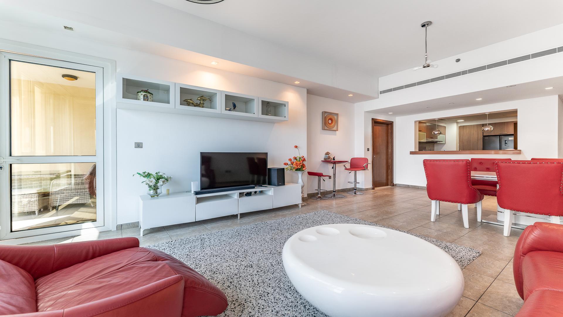N/A,Furnished Palm Jumeirah apartment living room with red chairs and modern decor, Marina Residences