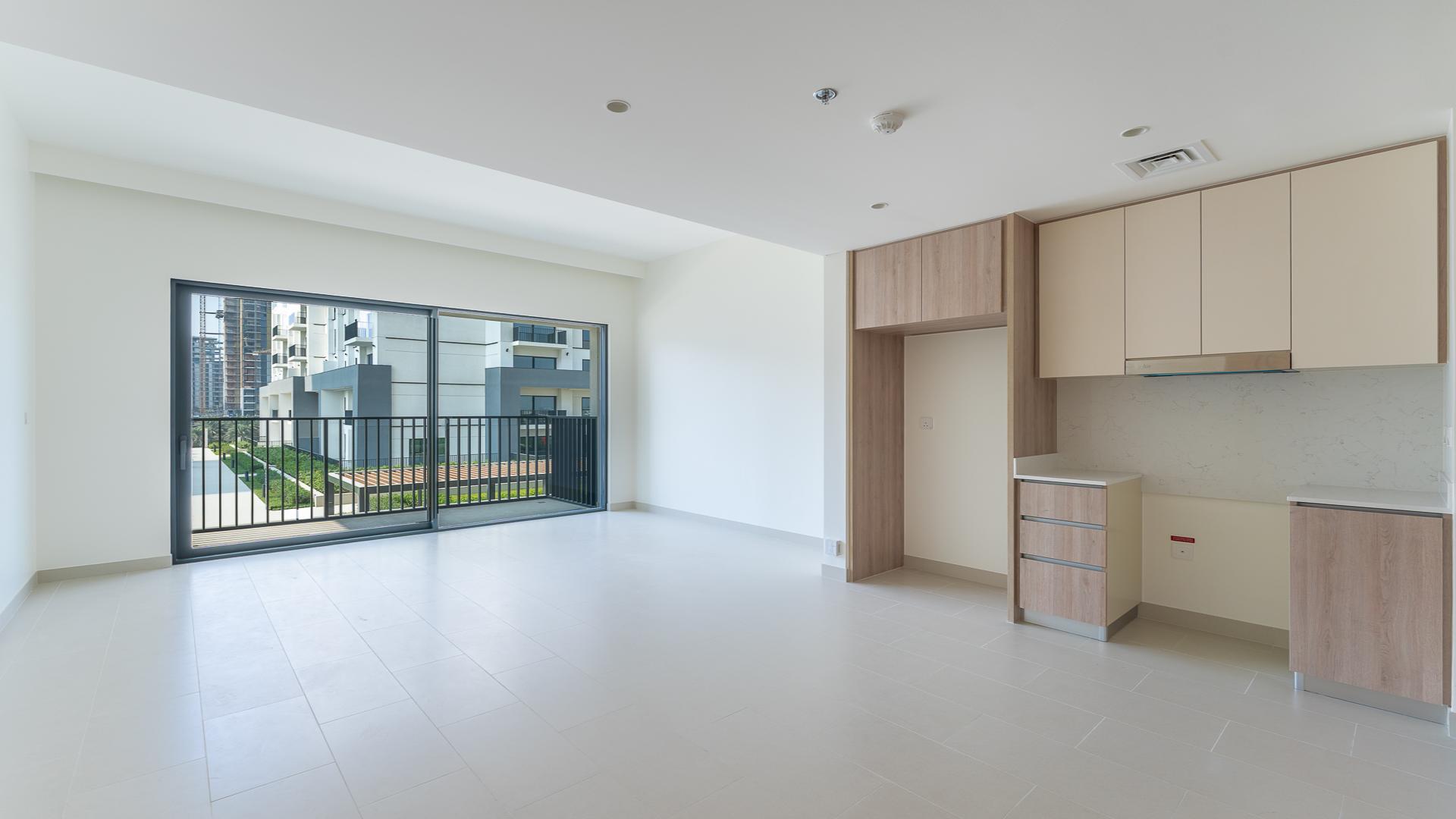 Modern kitchen and living area in Dubai Hills Estate apartment for rent, Park Field Tower 1