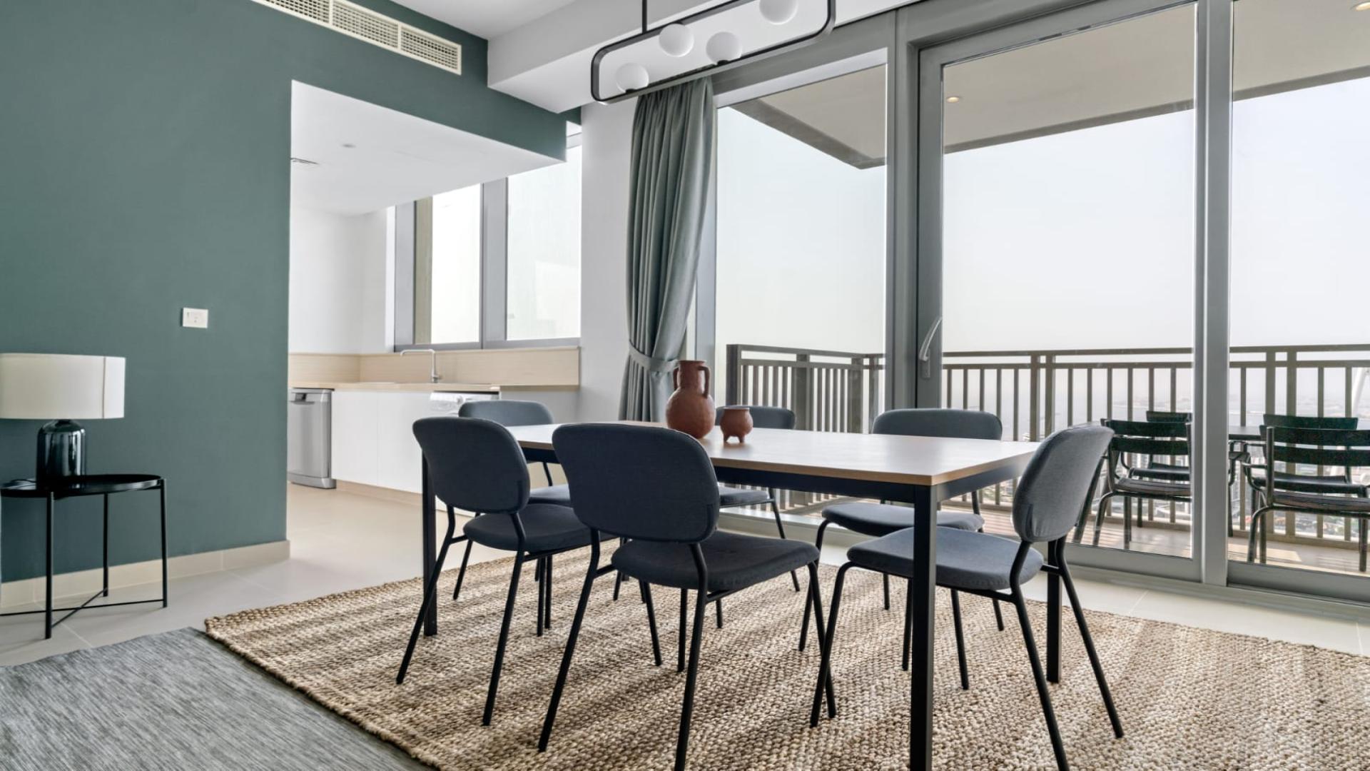 Modern living room in Dubai Marina apartment, 52 42 Tower, with stylish furniture and decor